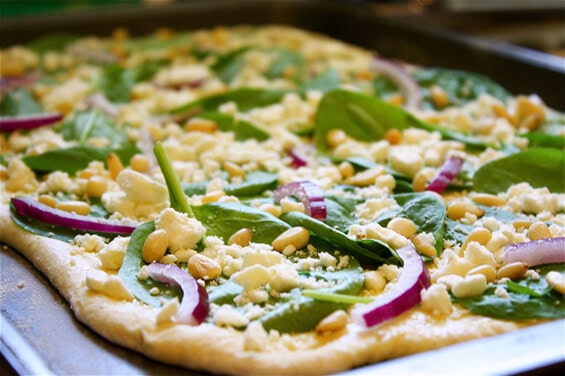 spinach-feta-and-pine-nut-pizza-prep spinach-feta-and-pine-nut-pizza-prep