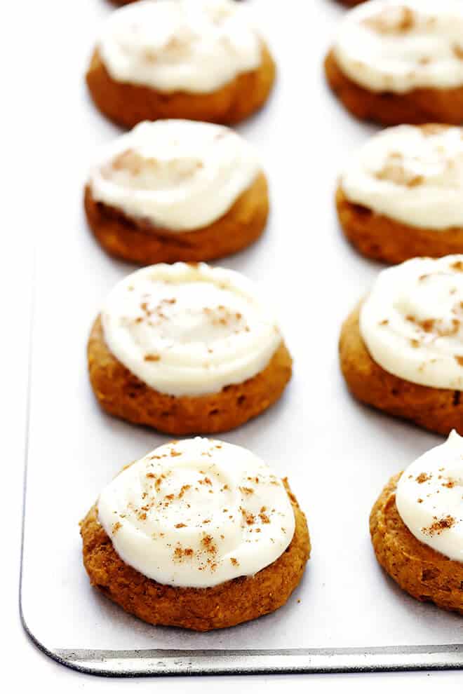 My favorite pumpkin cookie recipe! These soft and delicious pumpkin cookies are iced with a heavenly cream cheese frosting, and are the perfect treat for fall dessert baking. So delicious! | gimmesomeoven.com #pumpkin #cookies #creamcheese #frosting #dessert #fall Pumpkin Cookies