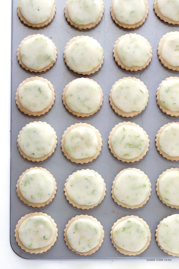 Coconut Lime Shortbread Cookies -- full of fresh lime, coconut, and buttery flavors, and topped with a light lime glaze. One of my all-time favorite cookie recipes! | gimmesomeoven.com