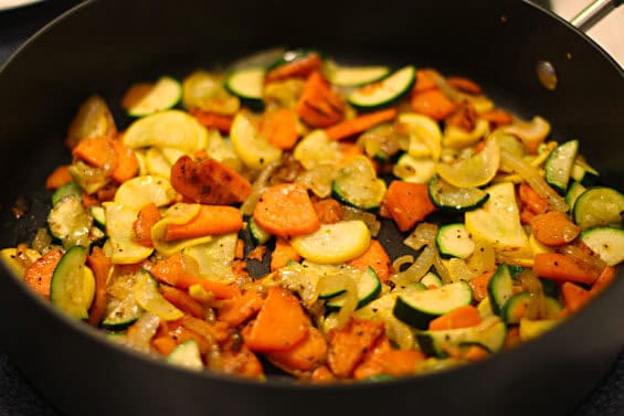 sweet potatoes, zucchini and onion cooking