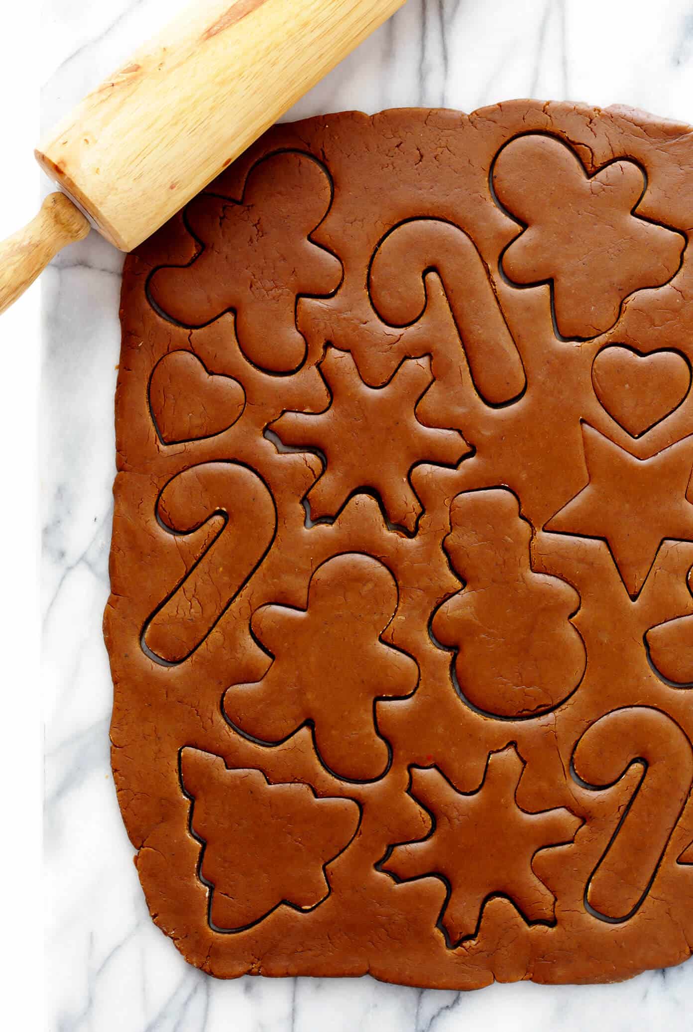 My favorite Gingerbread Cookies recipe! It's easy to make as soft or as crispy as you'd like, the cookies are easy to cut out and decorate, and they are perfect for the holidays! | Gimme Some Oven #gingerbread #cookies #christmas #holiday #ginger #frosting #icing #dessert Cut Out Gingerbread Cookie Dough