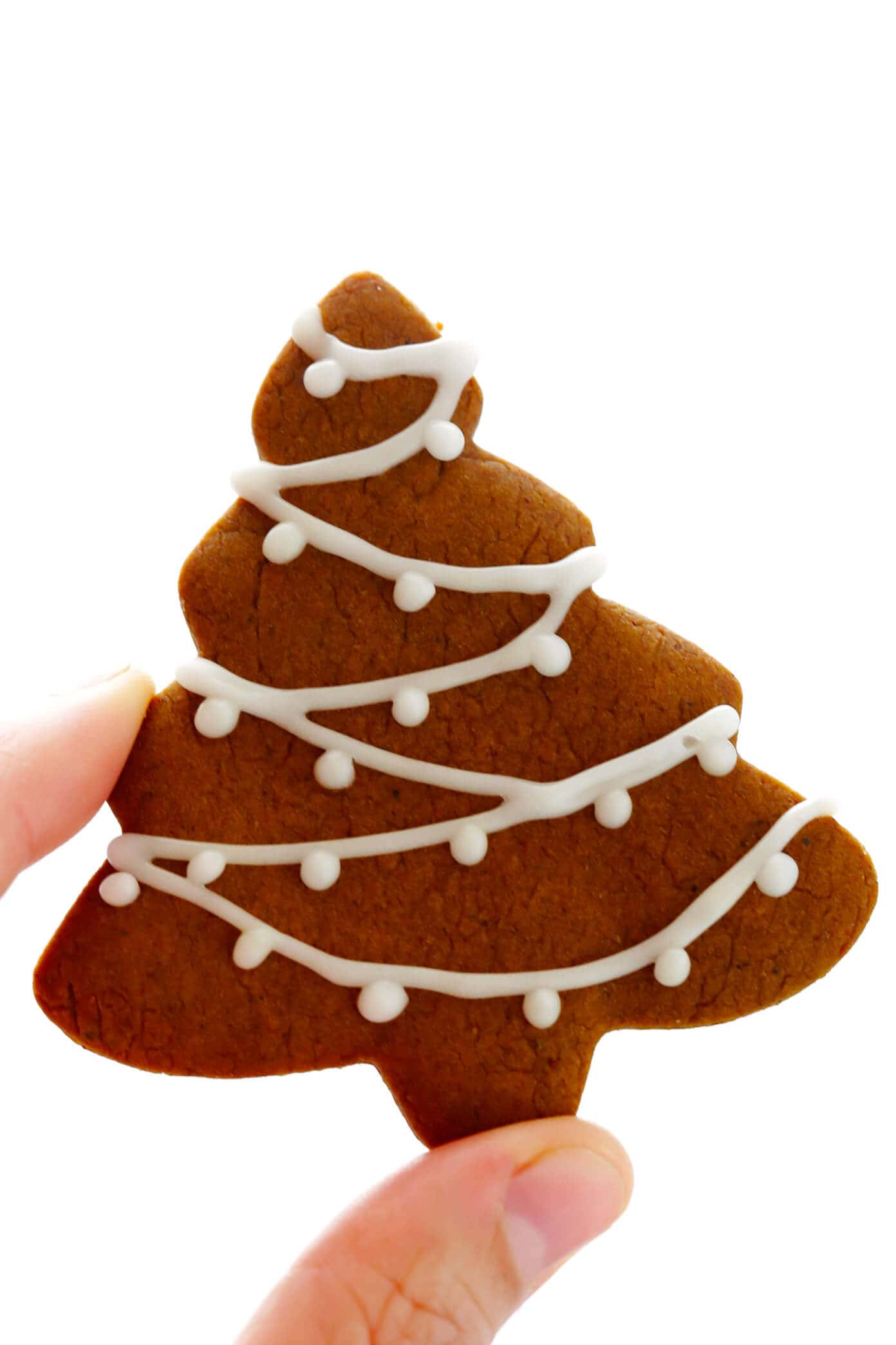 My favorite Gingerbread Cookies recipe! It's easy to make as soft or as crispy as you'd like, the cookies are easy to cut out and decorate, and they are perfect for the holidays! | Gimme Some Oven #gingerbread #cookies #christmas #holiday #ginger #frosting #icing #dessert Gingerbread Cookie Christmas Tree
