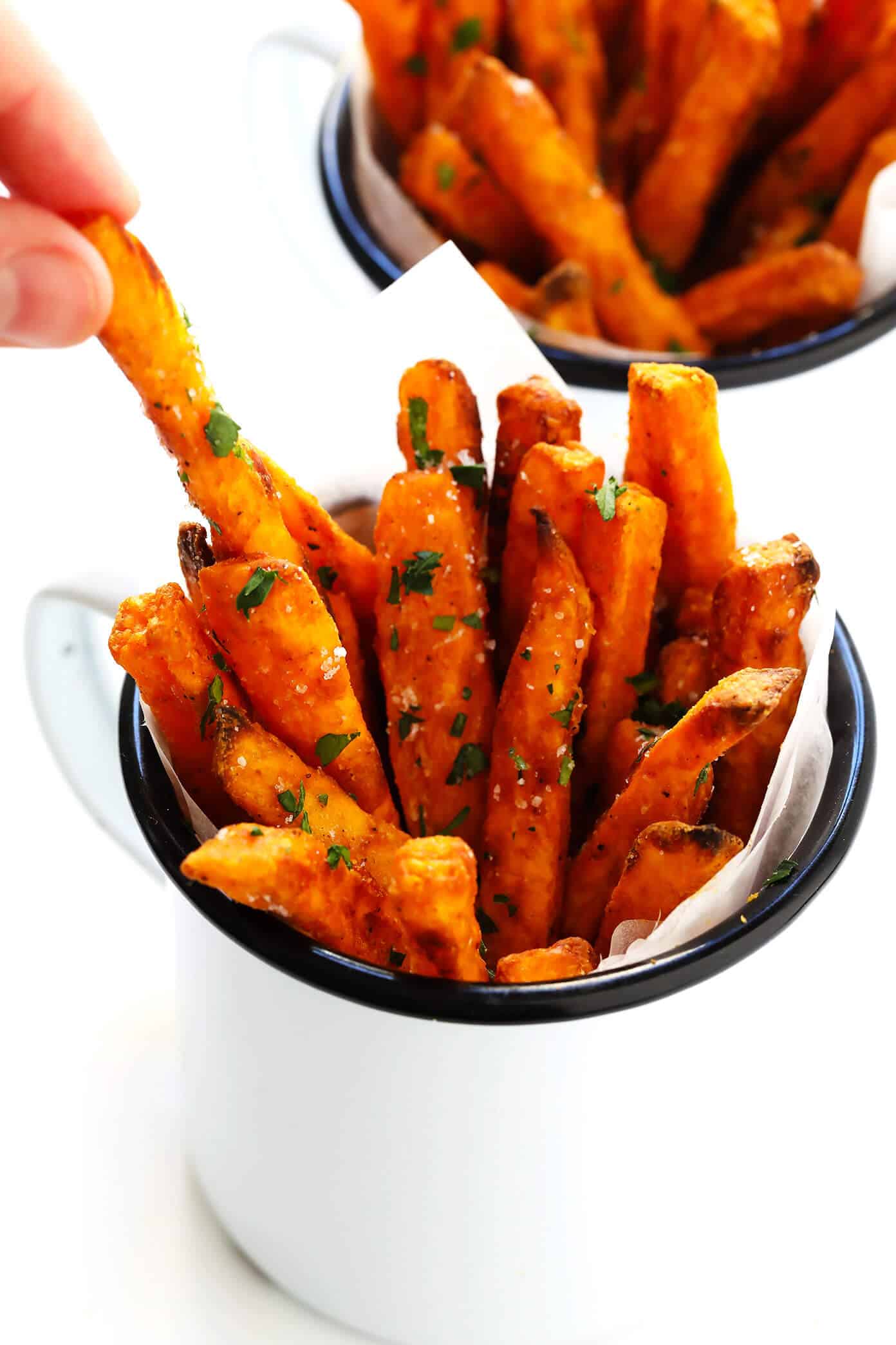 The BEST Baked Sweet Potato Fries Recipe! As in, ultra crispy, perfectly seasoned, and irresistibly delicious. Perfect when served as an appetizer, side dish, or snack. And also naturally gluten-free, vegan and vegetarian. | Gimme Some Oven #sweetpotato #fries #healthy #baked #side #snack #appetizer #gameday #recipe Crispy Sweet Potato Fries Recipe