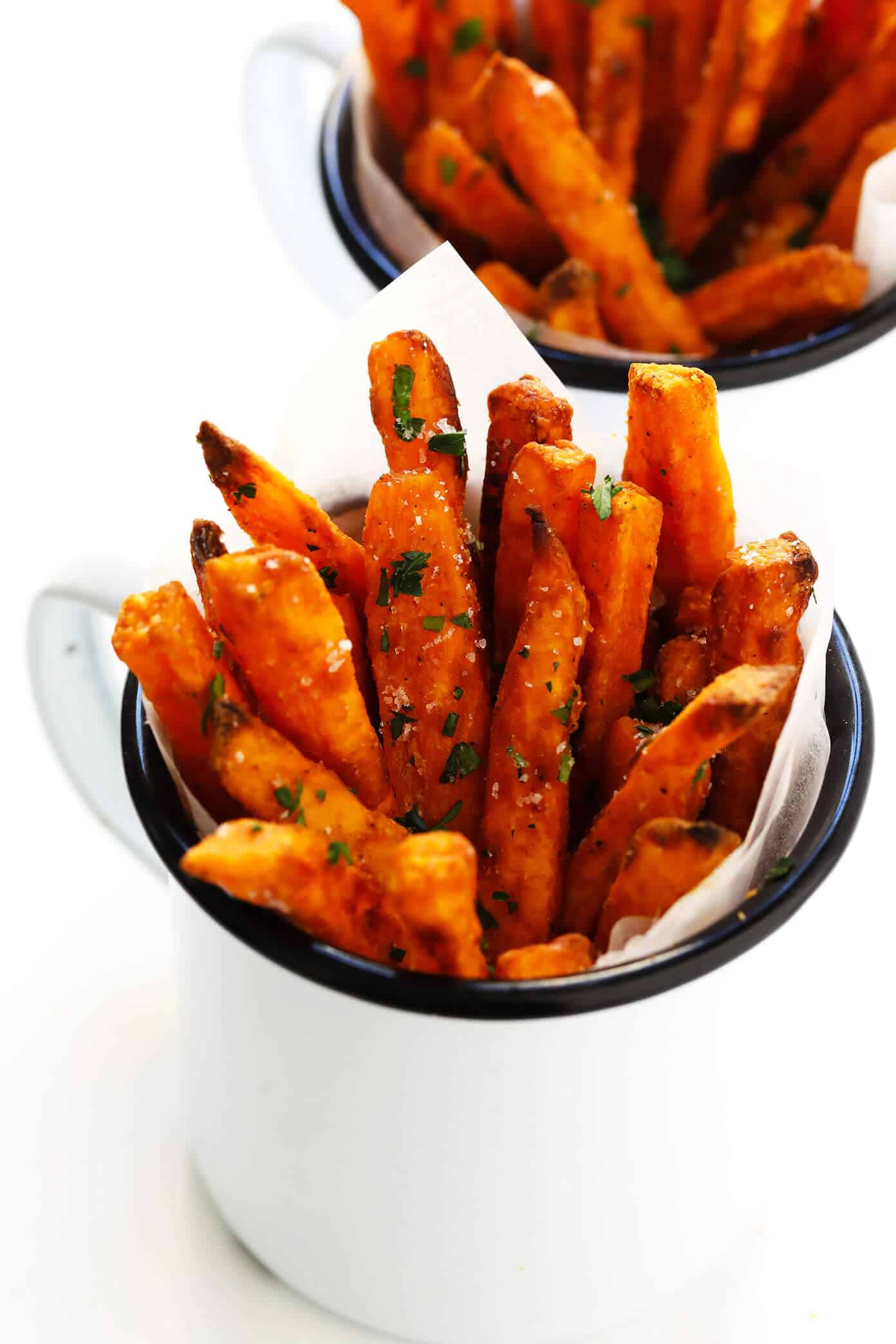 The BEST Baked Sweet Potato Fries Recipe! As in, ultra crispy, perfectly seasoned, and irresistibly delicious. Perfect when served as an appetizer, side dish, or snack. And also naturally gluten-free, vegan and vegetarian. | Gimme Some Oven #sweetpotato #fries #healthy #baked #side #snack #appetizer #gameday #recipe The BEST Sweet Potato Fries Recipe