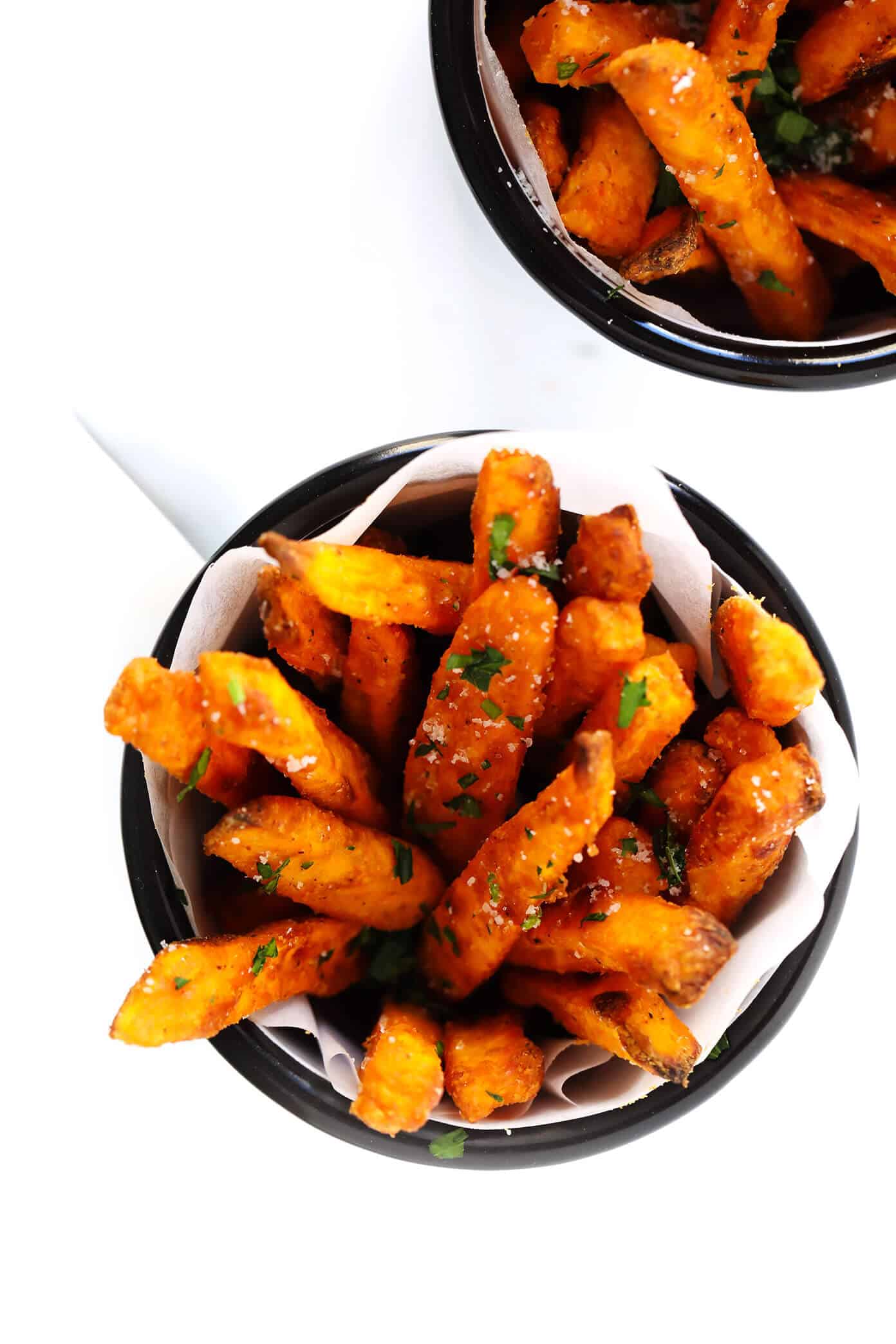 The BEST Baked Sweet Potato Fries Recipe! As in, ultra crispy, perfectly seasoned, and irresistibly delicious. Perfect when served as an appetizer, side dish, or snack. And also naturally gluten-free, vegan and vegetarian. | Gimme Some Oven #sweetpotato #fries #healthy #baked #side #snack #appetizer #gameday #recipe The BEST Crispy Oven-Baked Sweet Potato Fries Recipe