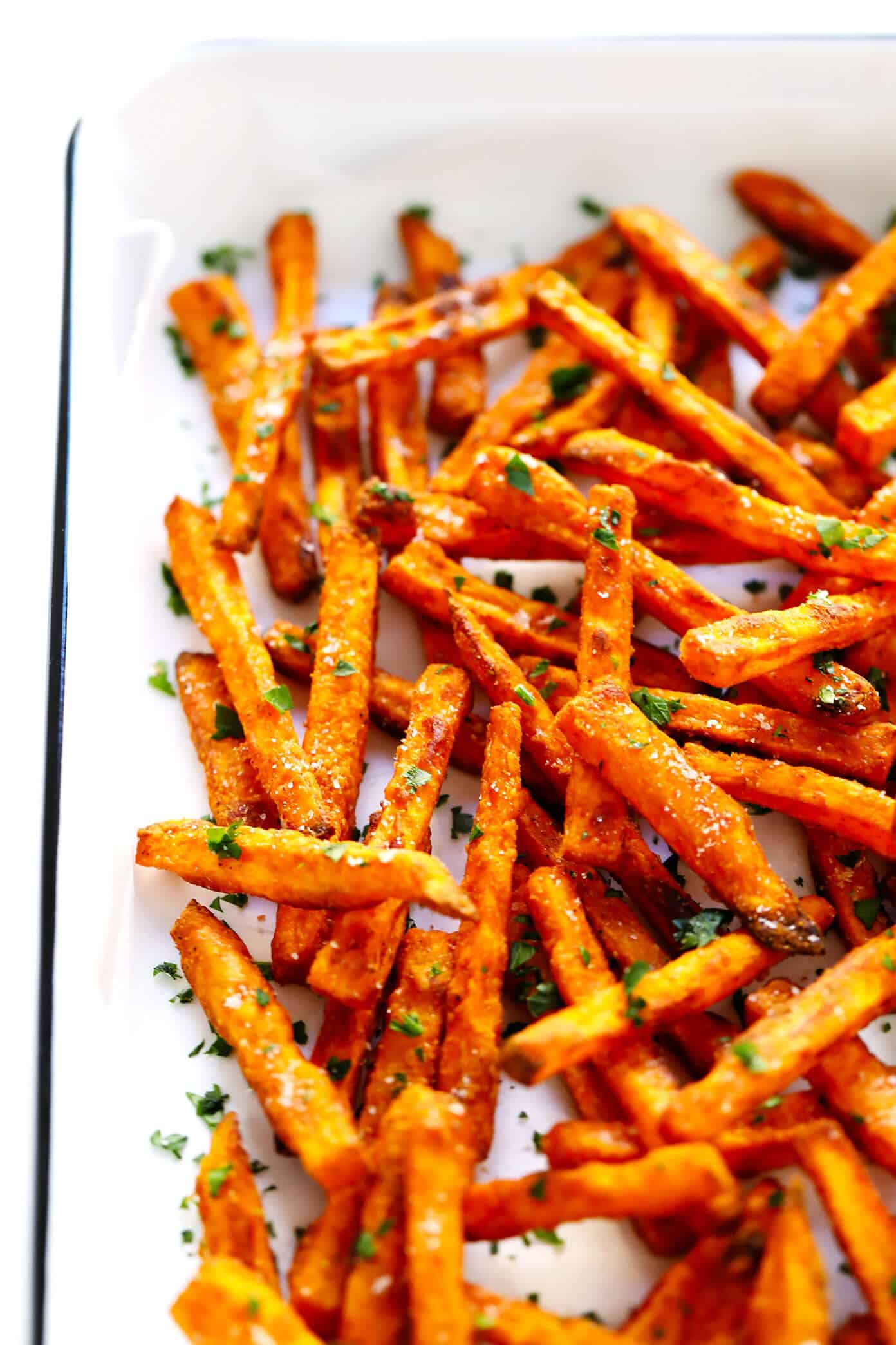 The BEST Baked Sweet Potato Fries Recipe! As in, ultra crispy, perfectly seasoned, and irresistibly delicious. Perfect when served as an appetizer, side dish, or snack. And also naturally gluten-free, vegan and vegetarian. | Gimme Some Oven #sweetpotato #fries #healthy #baked #side #snack #appetizer #gameday #recipe The BEST Sweet Potato Fries Recipe
