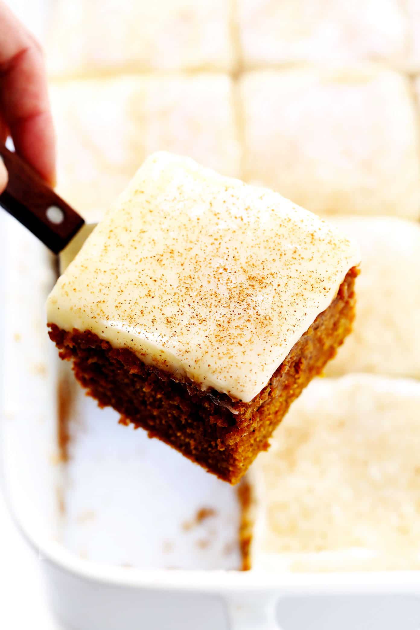 The BEST pumpkin bars recipe! They are nice and moist, made with the perfect amount of pumpkin spice, and topped with the most heavenly cream cheese frosting. The perfect fall or Thanksgiving dessert! | gimmesomeoven.com #pumpkin #bars #dessert #creamcheese #frosting #thanksgiving #fall #baking #cake Pumpkin Bars Recipe