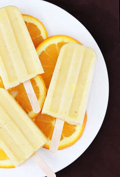 Pineapple Orange Banana Popsicles | gimmesomeoven.com