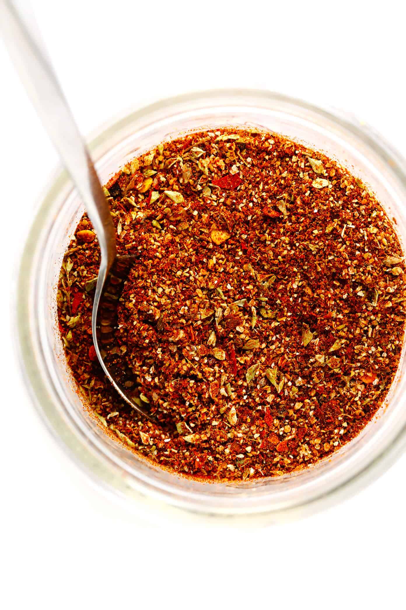 This homemade taco seasoning recipe is easy to make in just a few minutes with ingredients you already have in your spice cabinet. And it tastes great with everything from proteins (chicken, beef, pork, shrimp, tofu, etc.) to veggies, rice, beans, dips, salsa and more. | gimmesomeoven.com Homemade Taco Seasoning Recipe
