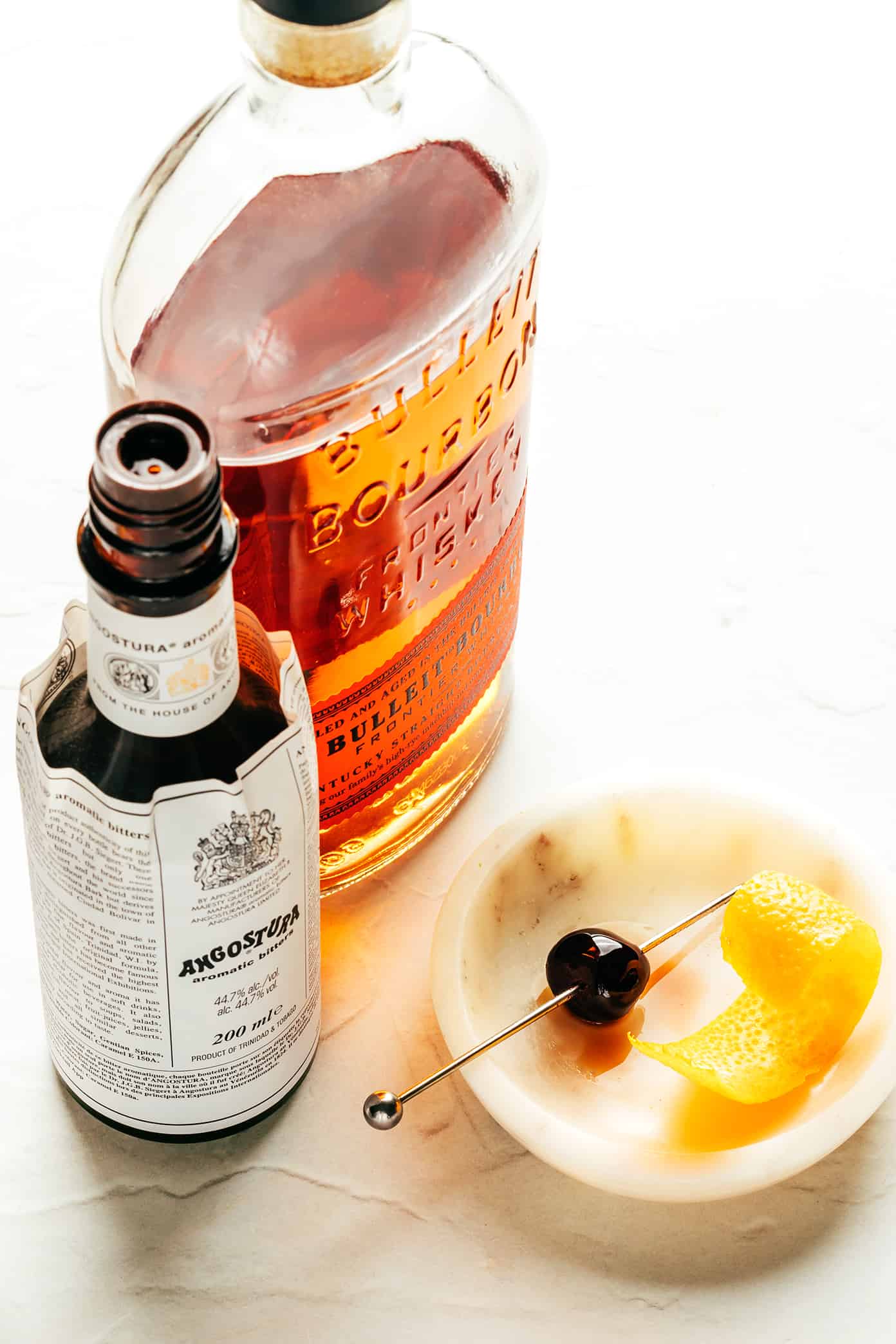This classic old fashioned recipe is easy to make with bourbon, bitters, orange peel and your choice of sweetener. Such a simple, satisfying and swanky cocktail that never disappoints! | gimmesomeoven.com Old Fashioned Ingredients