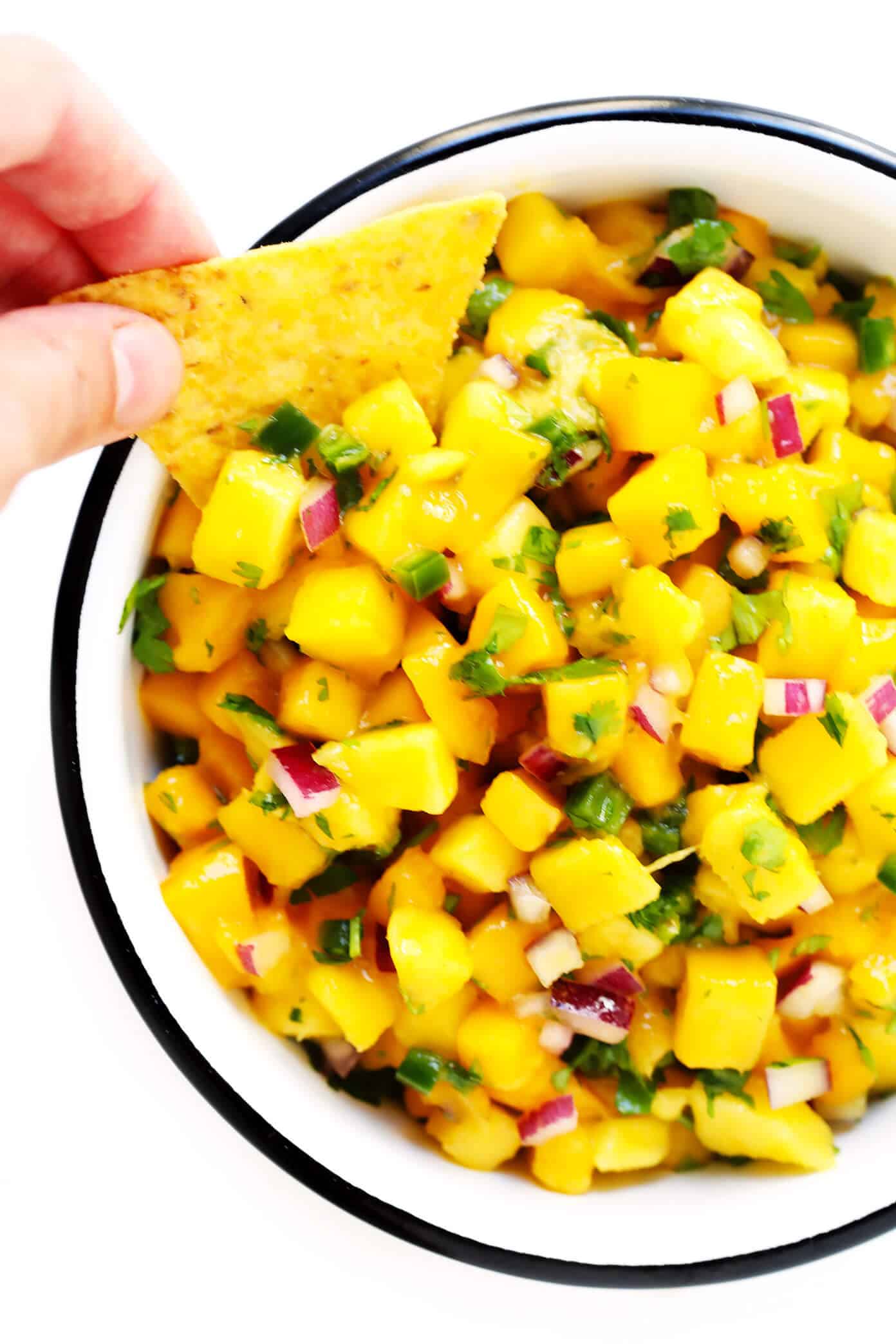 The BEST fresh mango salsa recipe! It's made with just 5-ingredients, and is perfect as a dip or topping for your favorite Mexican dishes. | Gimme Some Oven #mango #salsa #fruit #glutenfree #vegan #mexican #appetizer 5-Ingredient Fresh Mango Salsa Recipe
