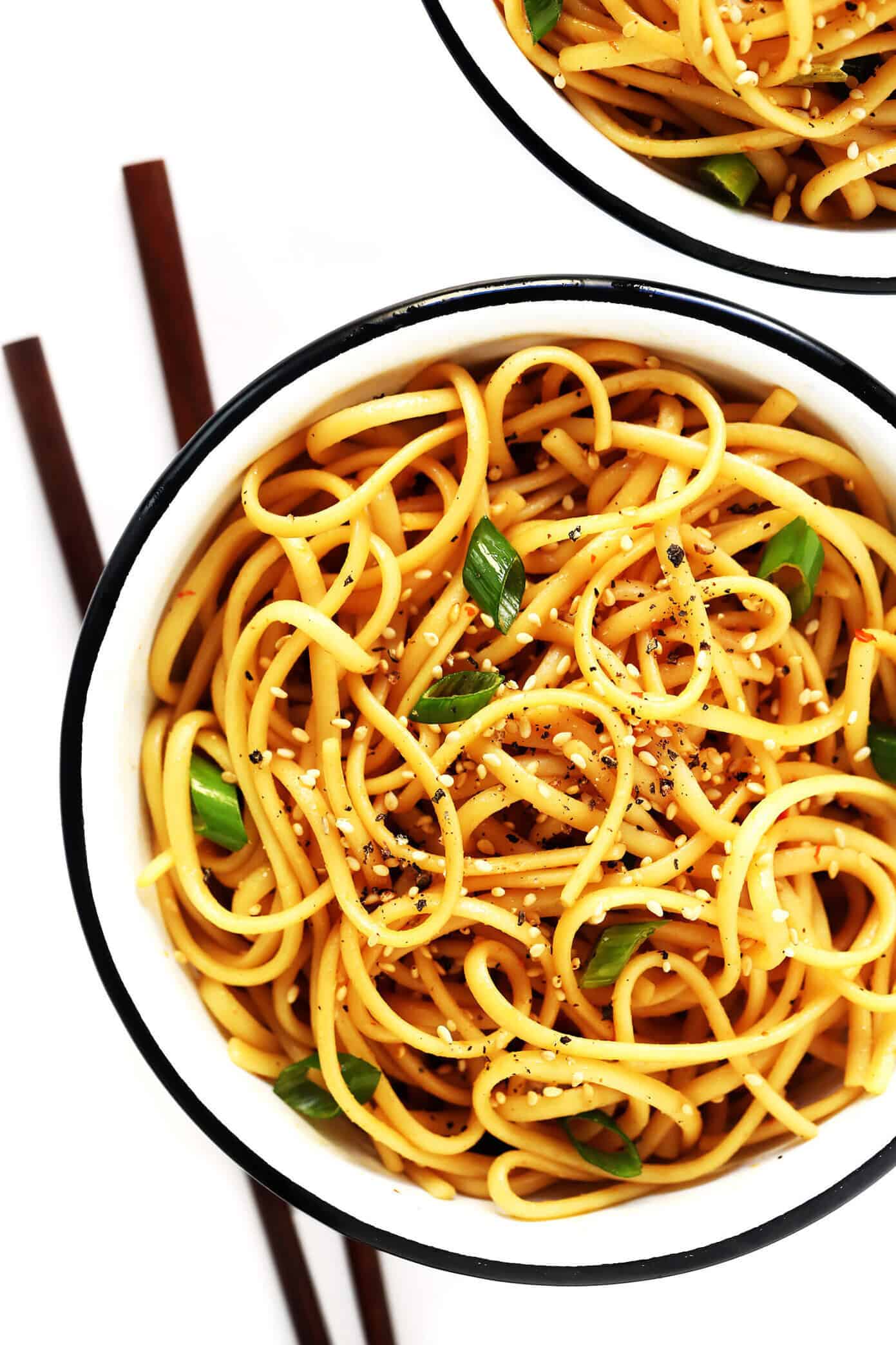 This 15-Minute Sesame Noodles recipe is super easy to make is just as delicious served warm or cold as a side dish. Feel free to add in extra veggies and/or proteins (such as chicken, beef, shrimp, tofu, etc.) to make it a main course! | gimmesomeoven.com #noodles #sesame #side #sauce #chinese #dinner #pasta Sesame Noodles