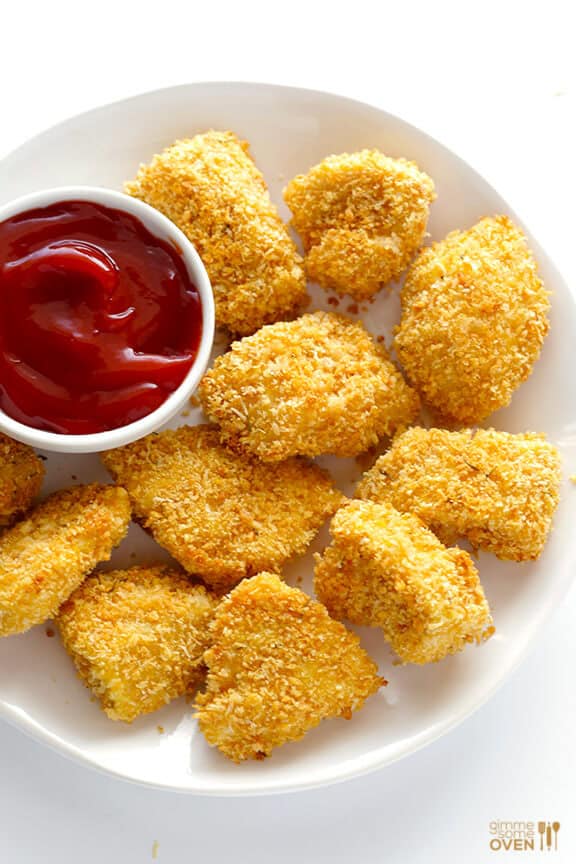 Parmesan Baked Chicken Nuggets -- crispy, easy to make, and SO tasty! | gimmesomeoven.com Parmesan Baked Chicken Nuggets -- crispy, easy to make, and SO tasty! | gimmesomeoven.com