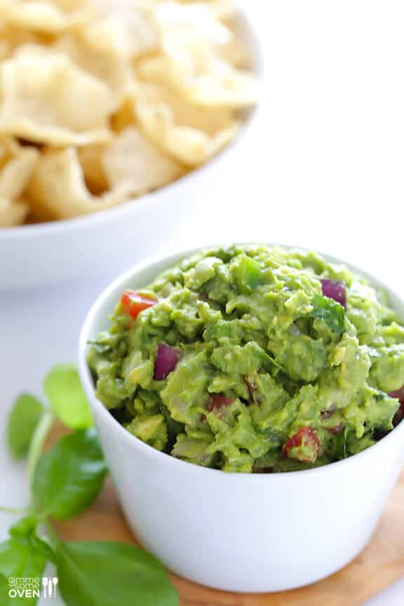 Italian Guacamole -- fresh basil is the rockstar of this delicious twist on classic guacamole | gimmesomeoven.com #appetizer #dip #glutenfree #vegan Italian Guacamole -- fresh basil is the rockstar of this delicious twist on classic guacamole | gimmesomeoven.com #appetizer #dip #glutenfree #vegan