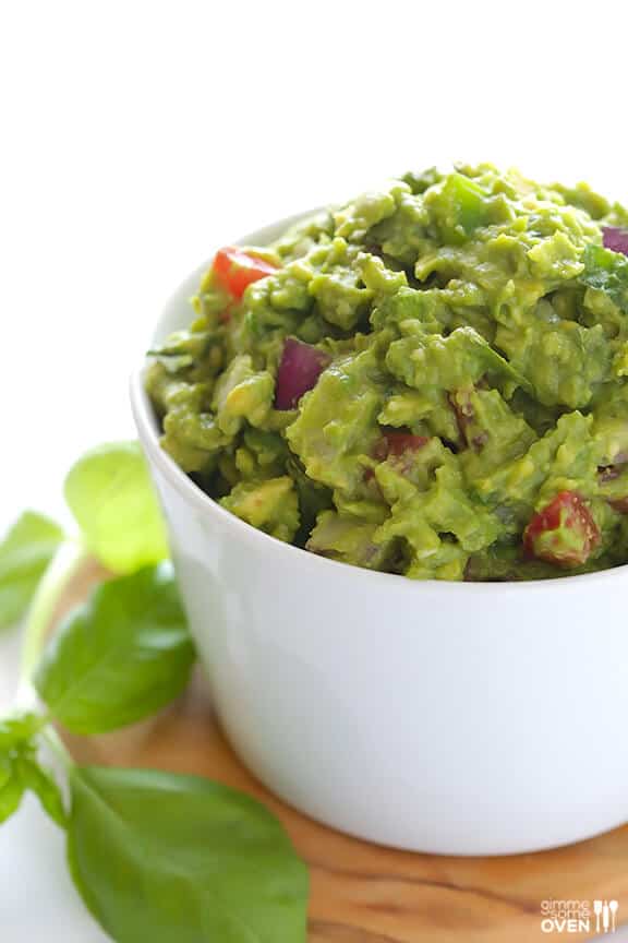 Italian Guacamole -- fresh basil is the rockstar of this delicious twist on classic guacamole | gimmesomeoven.com #appetizer #dip #glutenfree #vegan Italian Guacamole -- fresh basil is the rockstar of this delicious twist on classic guacamole | gimmesomeoven.com #appetizer #dip #glutenfree #vegan