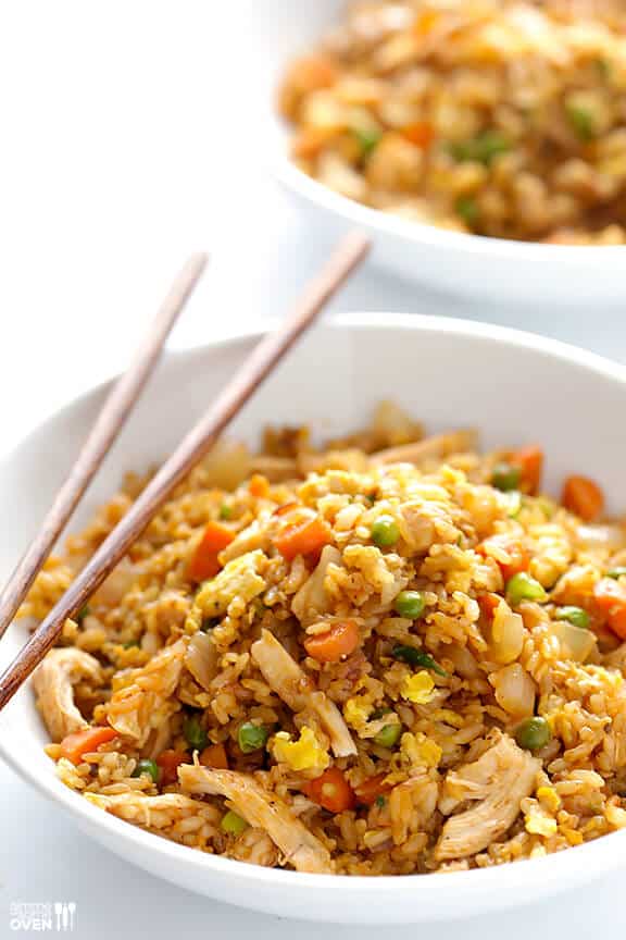 Spicy Chicken Fried Rice -- kicked up a notch with some sriracha, and ready to go in about 20 minutes! | gimmesomeoven.com Spicy Chicken Fried Rice -- kicked up a notch with some sriracha, and ready to go in about 20 minutes! | gimmesomeoven.com