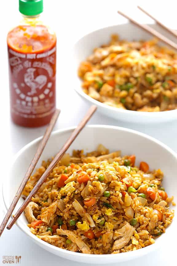 Spicy Chicken Fried Rice -- kicked up a notch with some sriracha, and ready to go in about 20 minutes! | gimmesomeoven.com Spicy Chicken Fried Rice -- kicked up a notch with some sriracha, and ready to go in about 20 minutes! | gimmesomeoven.com