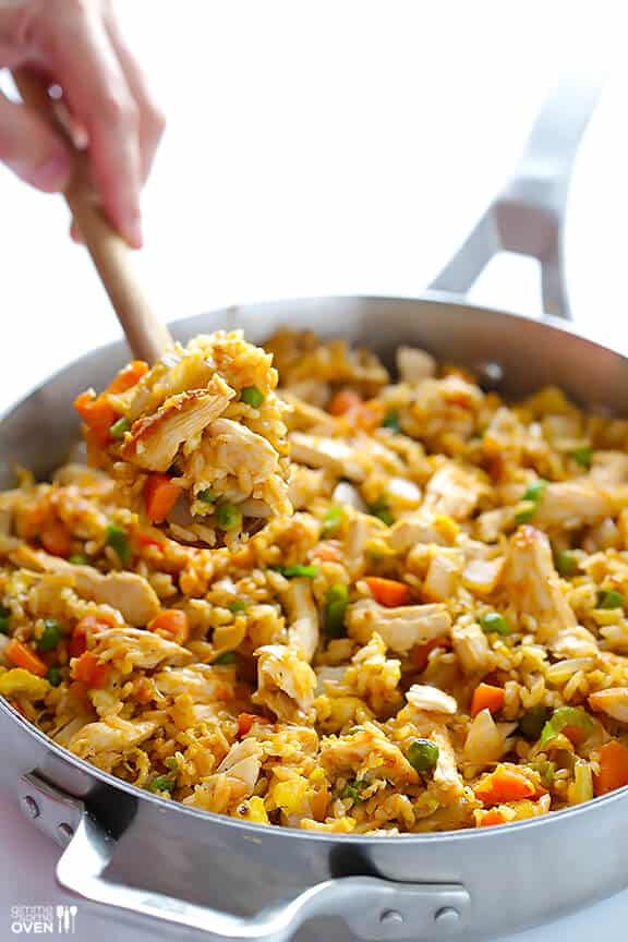 Spicy Chicken Fried Rice -- kicked up a notch with some sriracha, and ready to go in about 20 minutes! | gimmesomeoven.com Spicy Chicken Fried Rice -- kicked up a notch with some sriracha, and ready to go in about 20 minutes! | gimmesomeoven.com