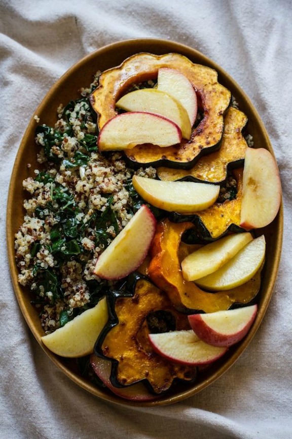 Roasted Acorn Squash and Apples with Quinoa, Kale, and Maple Tahini Dressing | edibleperspective.com Roasted Acorn Squash and Apples with Quinoa, Kale, and Maple Tahini Dressing | edibleperspective.com