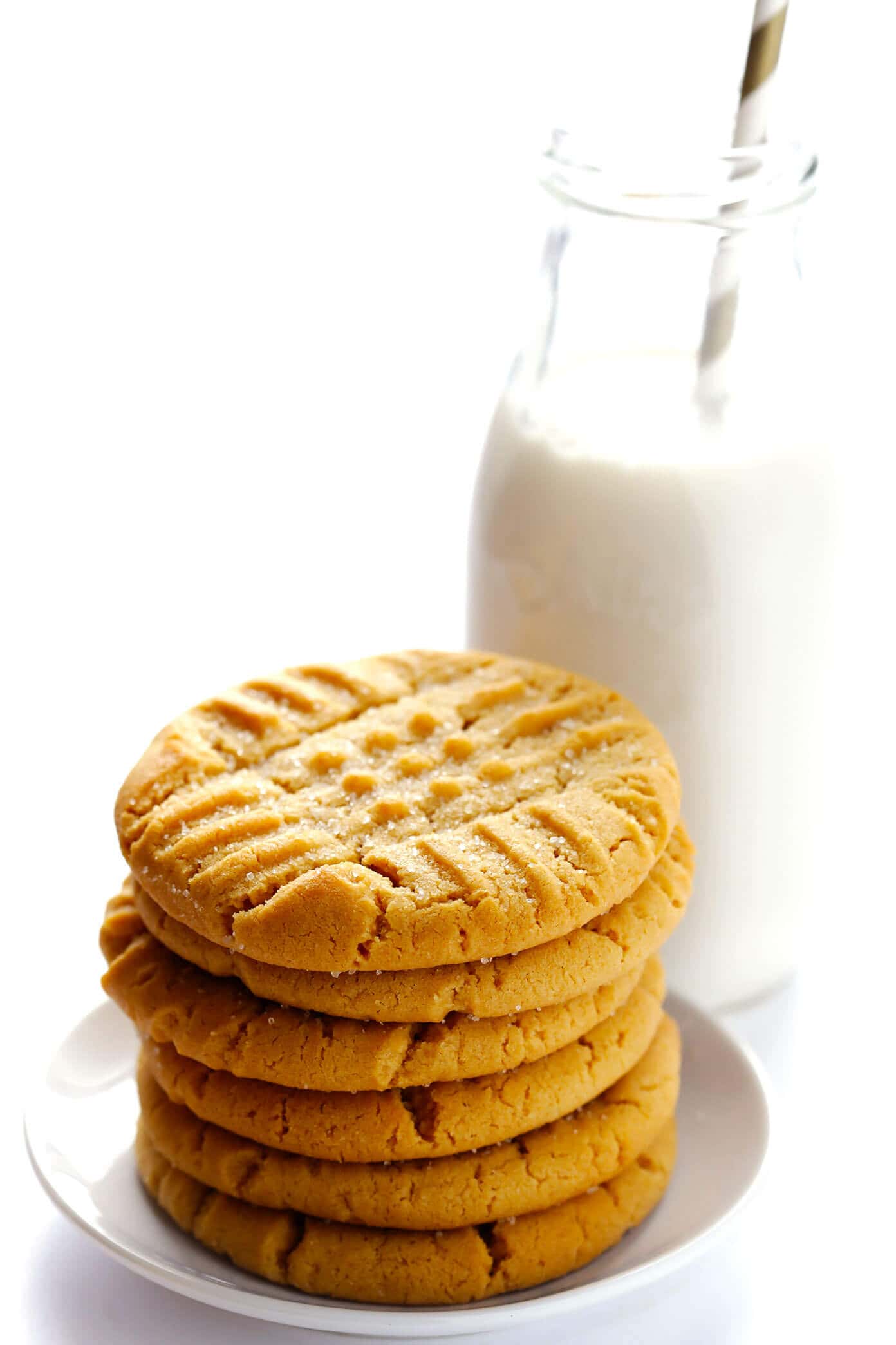 These classic Peanut Butter Cookies are perfectly soft, thick, chewy, and completely delicious! | Gimme Some Oven #peanutbutter #cookies #dessert #sweets #christmas #baking Peanut Butter Cookies with Milk