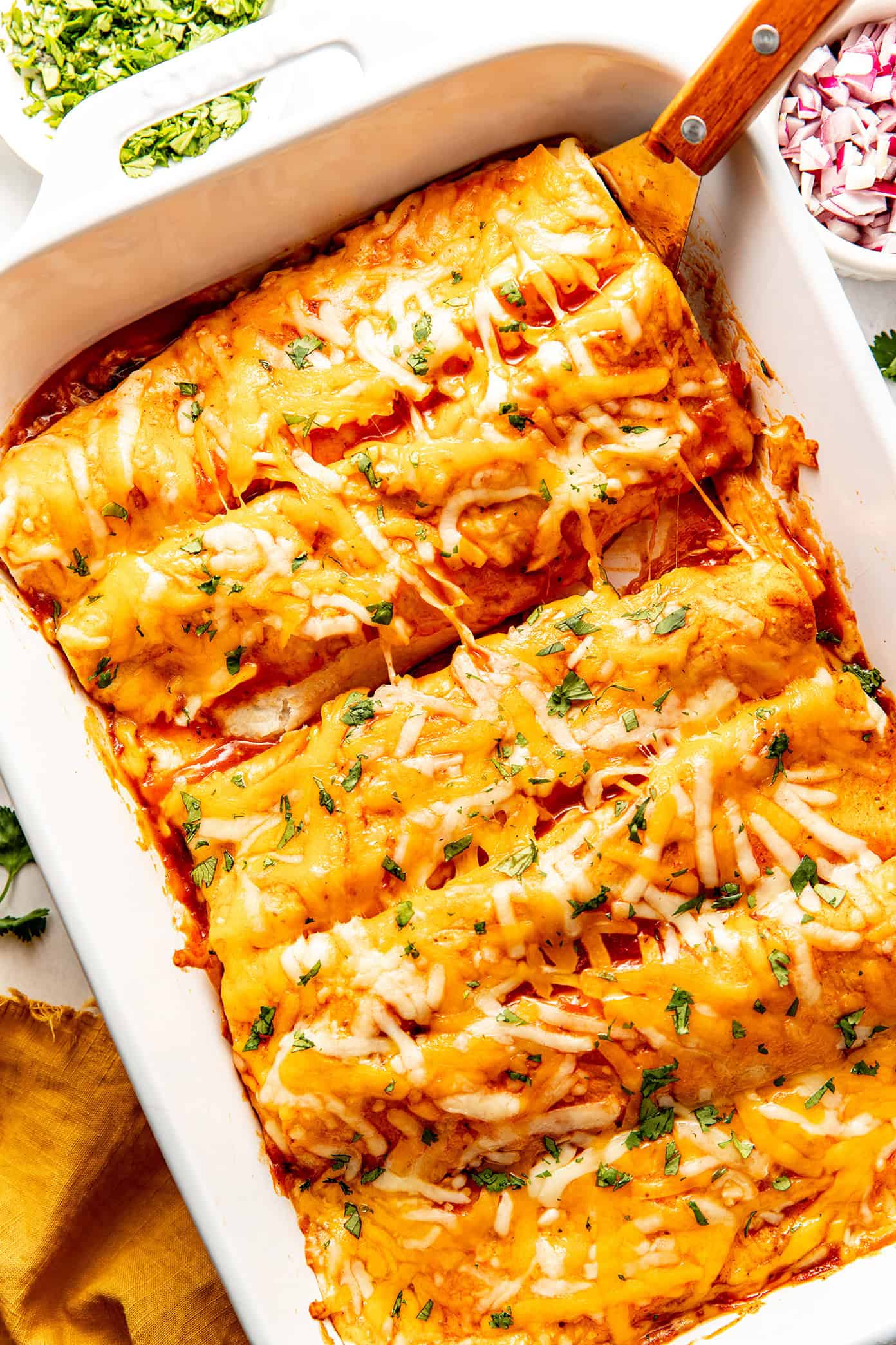 bbq chicken enchiladas in baking dish