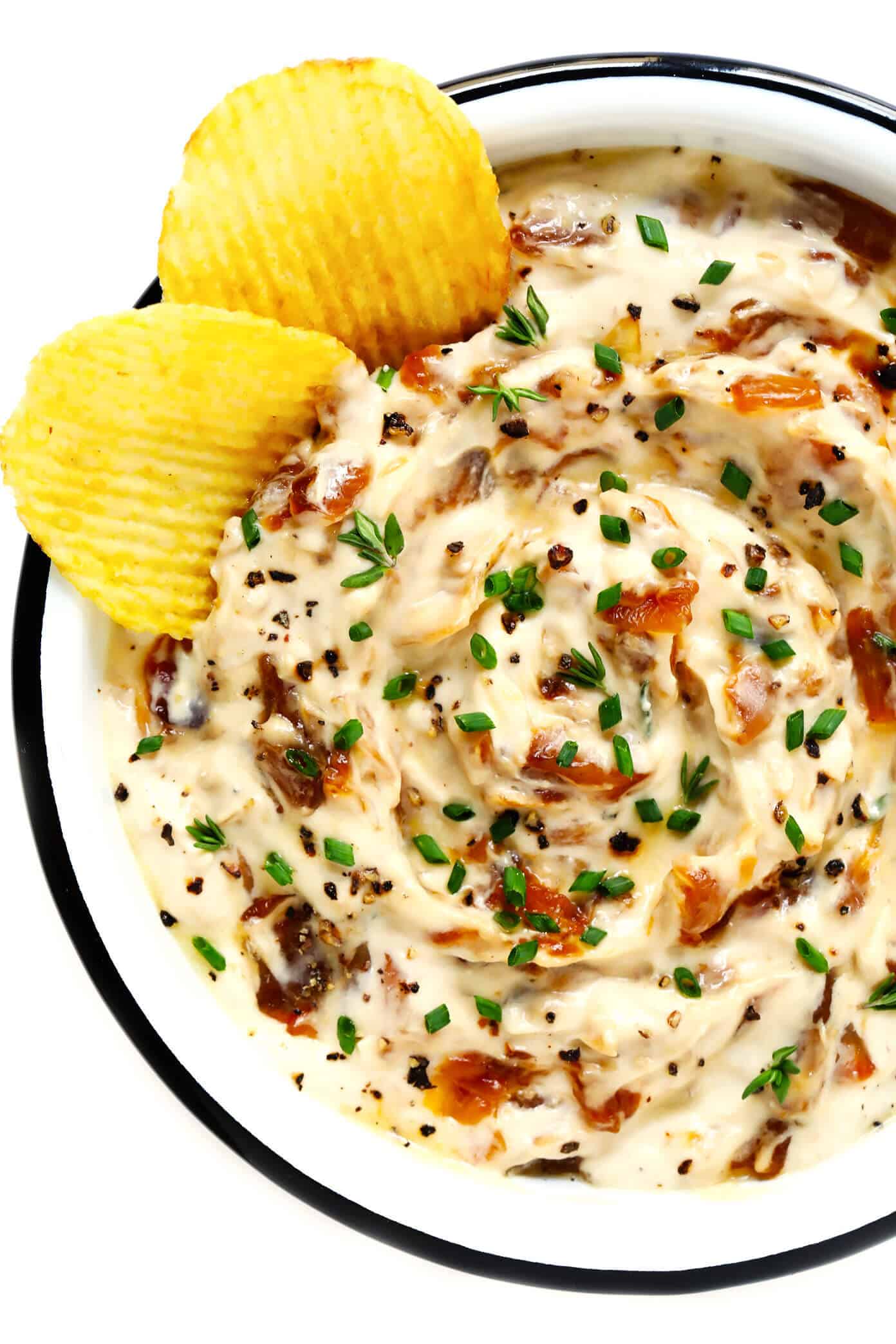 The BEST French onion dip recipe! It's creamy, savory, and a touch sweet (thanks to those delicious caramelized onions)...and downright irresistible. Serve it as a party appetizer, or use it as a spread for burgers, pizza and more! | gimmesomeoven.com #dip #appetizer #frenchonion #vegetarian #glutenfree #entertaining Caramelized Onion Dip Recipe