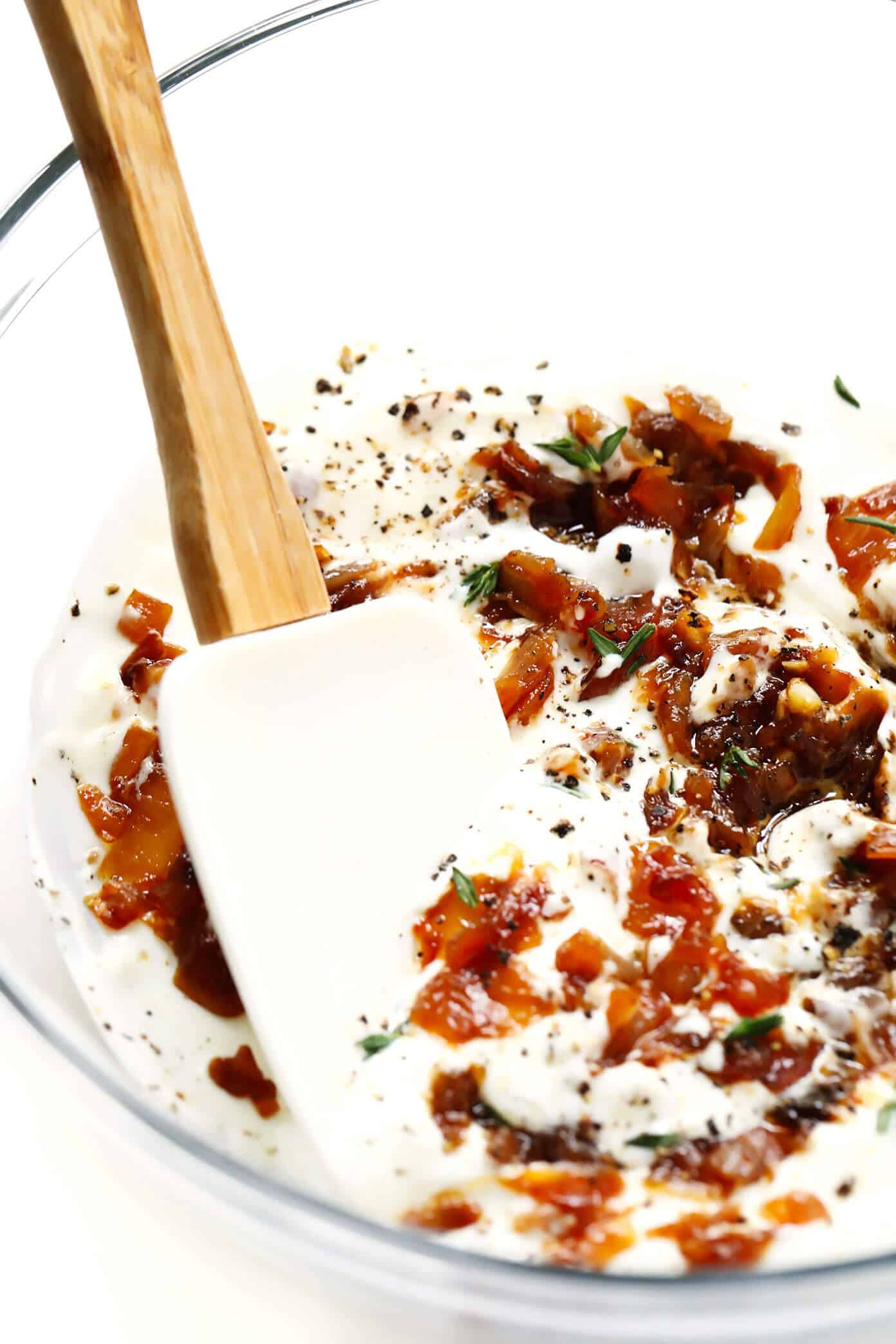 The BEST French onion dip recipe! It's creamy, savory, and a touch sweet (thanks to those delicious caramelized onions)...and downright irresistible. Serve it as a party appetizer, or use it as a spread for burgers, pizza and more! | gimmesomeoven.com #dip #appetizer #frenchonion #vegetarian #glutenfree #entertaining Homemade French Onion Dip Ingredients