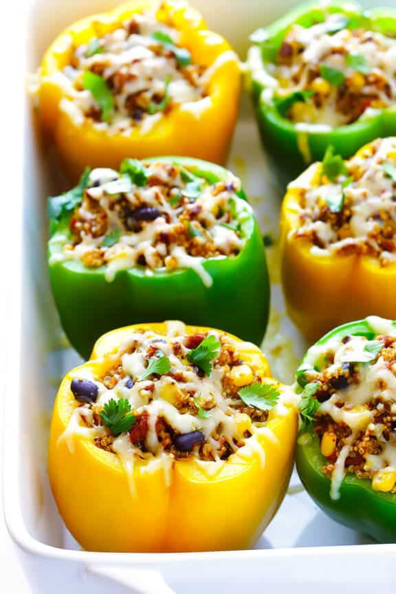 LOVE this 5-Ingredient Vegetarian Stuffed Peppers recipe! It's easy, cheesy, filled with lots of quinoa and black beans, and SO delicious! | gimmesomeoven.com
