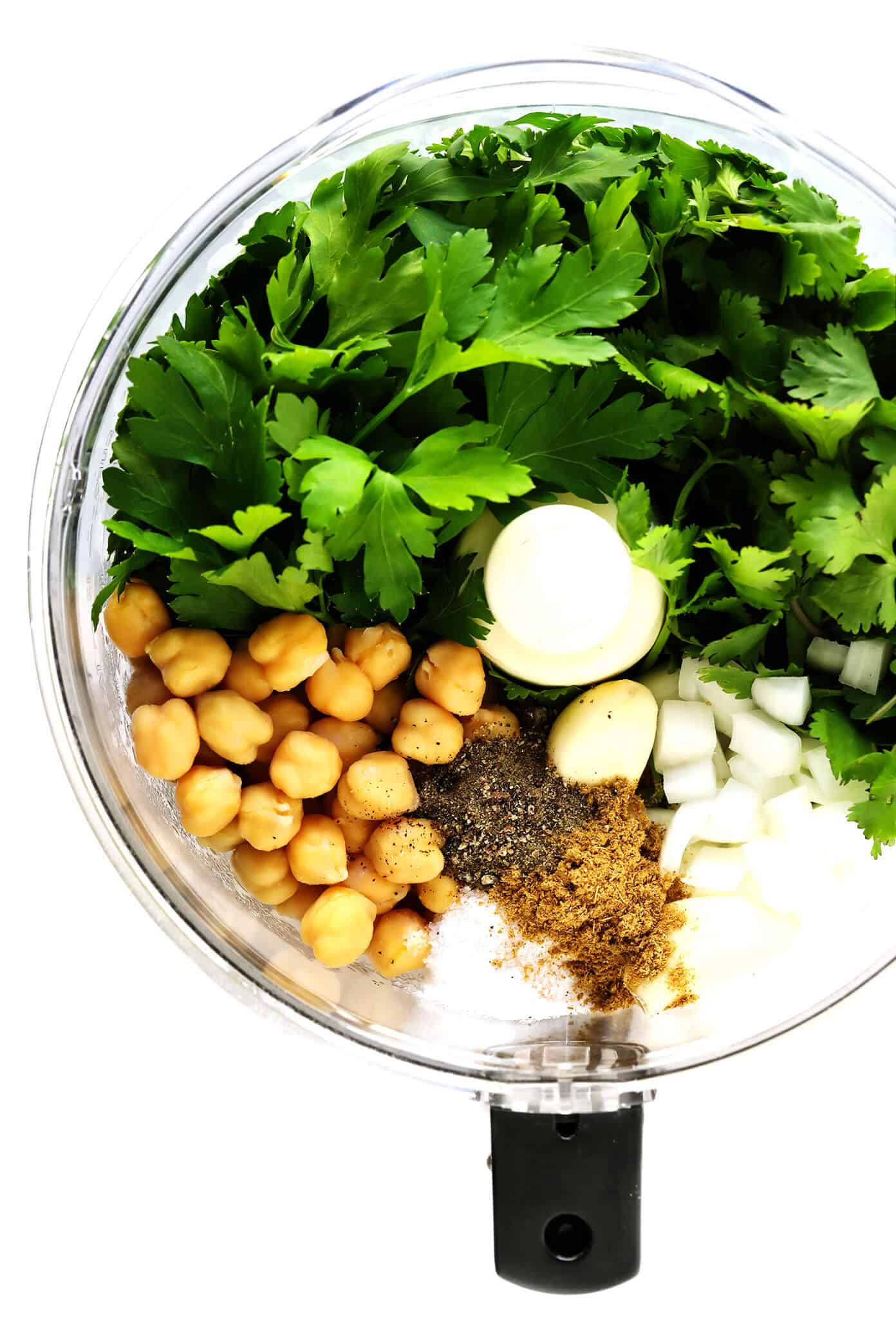 Learn how to make falafel with this easy homemade falafel recipe! It's bursting with zesty fresh fresh flavors, lightly pan-fried (instead of deep-fried), and perfect for falafel wraps, salads, sandwiches and more. Bonus, it's also naturally vegan and gluten-free. | gimmesomeoven.com #falafel #wrap #vegetarian #vegan #glutenfree #healthy #dinner #freezermeals Homemade Falafel Ingredients