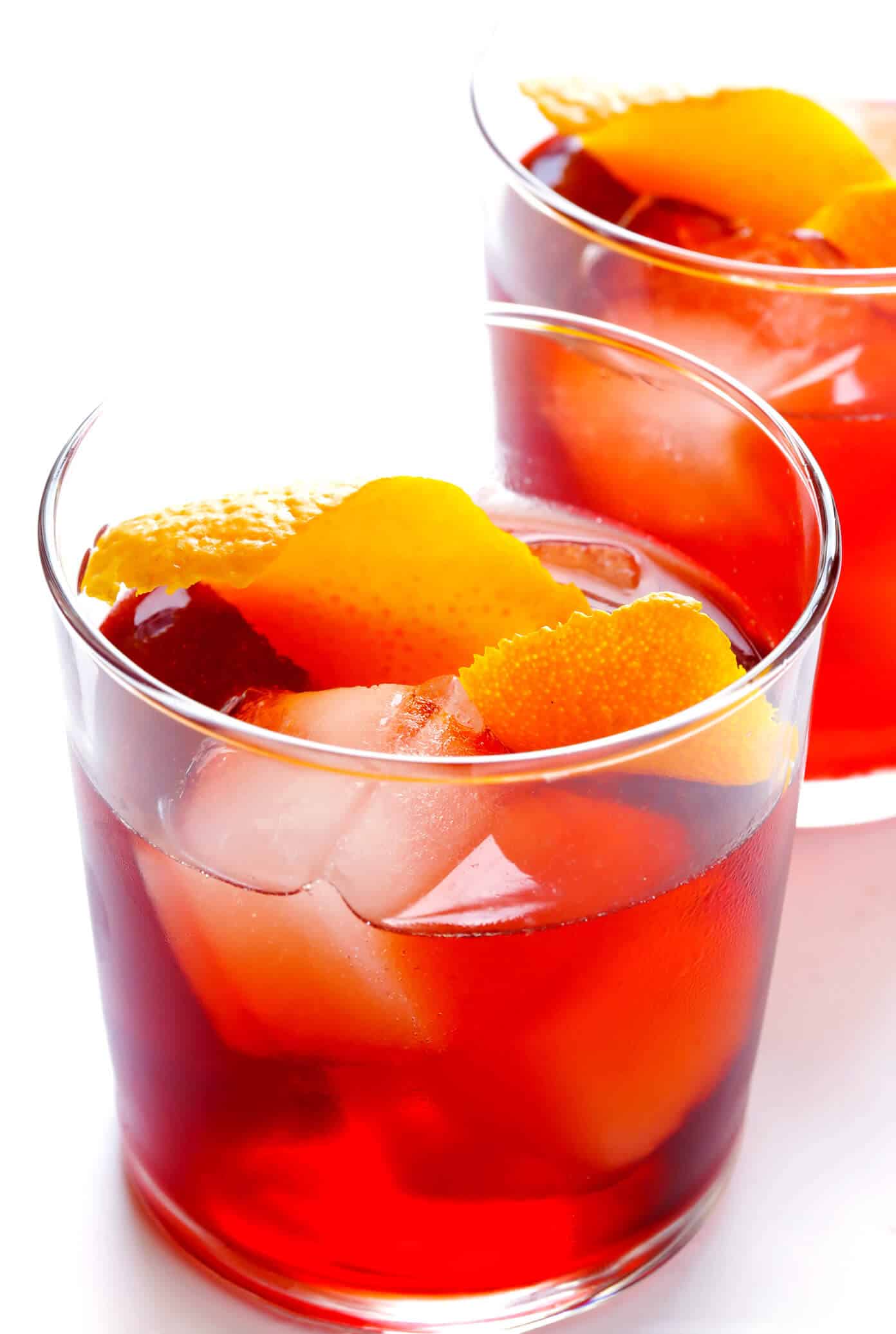 This classic negroni cocktail recipe is easy to make with three simple ingredients -- Campari, gin and sweet vermouth. It's the perfect cocktail for summer, Valentine's, 4th of July, or Christmas, and it's refreshingly not too sweet. | Gimme Some Oven #negroni #cocktail #gin #campari #vermouth #summer Negroni Recipe