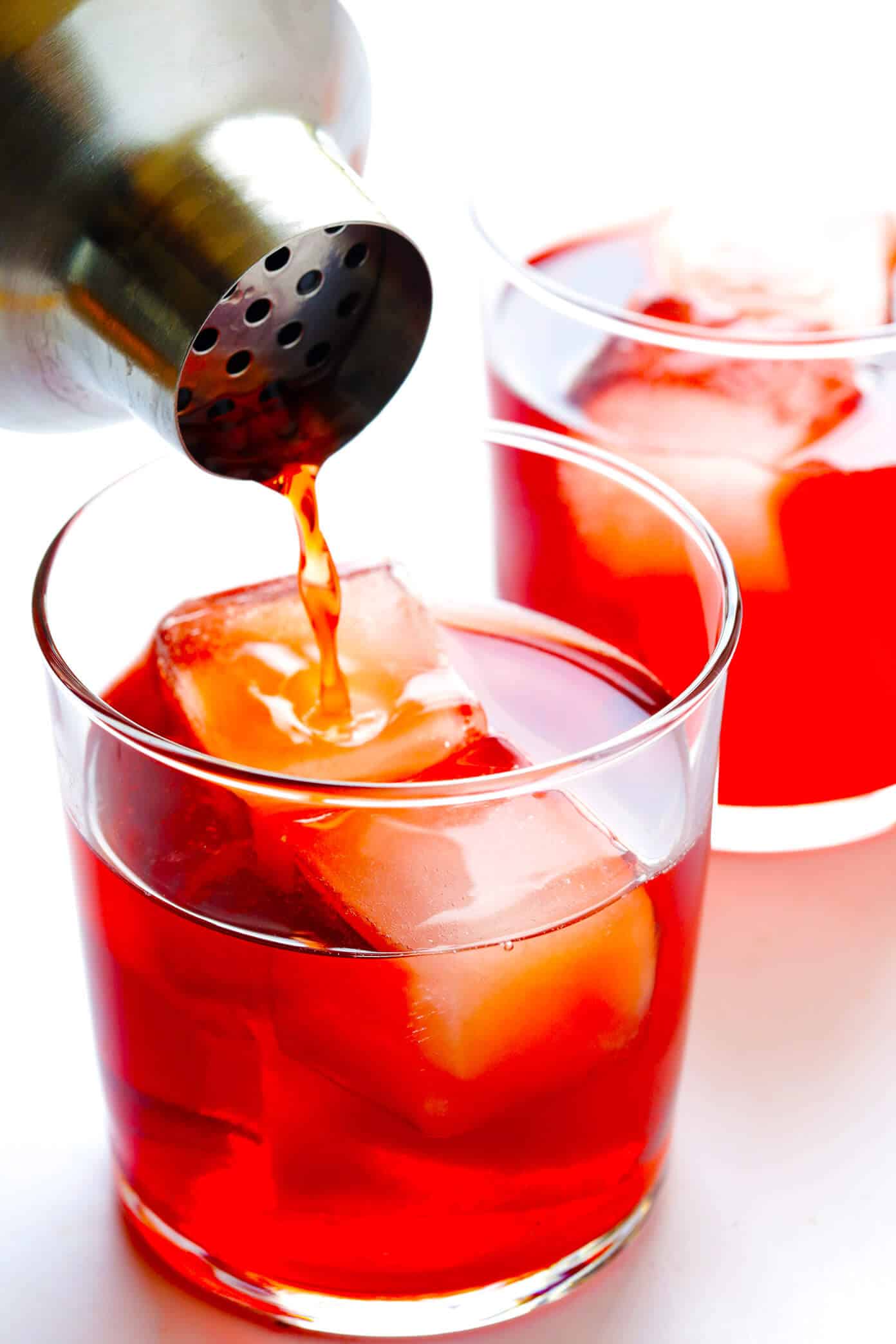 This classic negroni cocktail recipe is easy to make with three simple ingredients -- Campari, gin and sweet vermouth. It's the perfect cocktail for summer, Valentine's, 4th of July, or Christmas, and it's refreshingly not too sweet. | Gimme Some Oven #negroni #cocktail #gin #campari #vermouth #summer How To Make A Negroni Cocktail