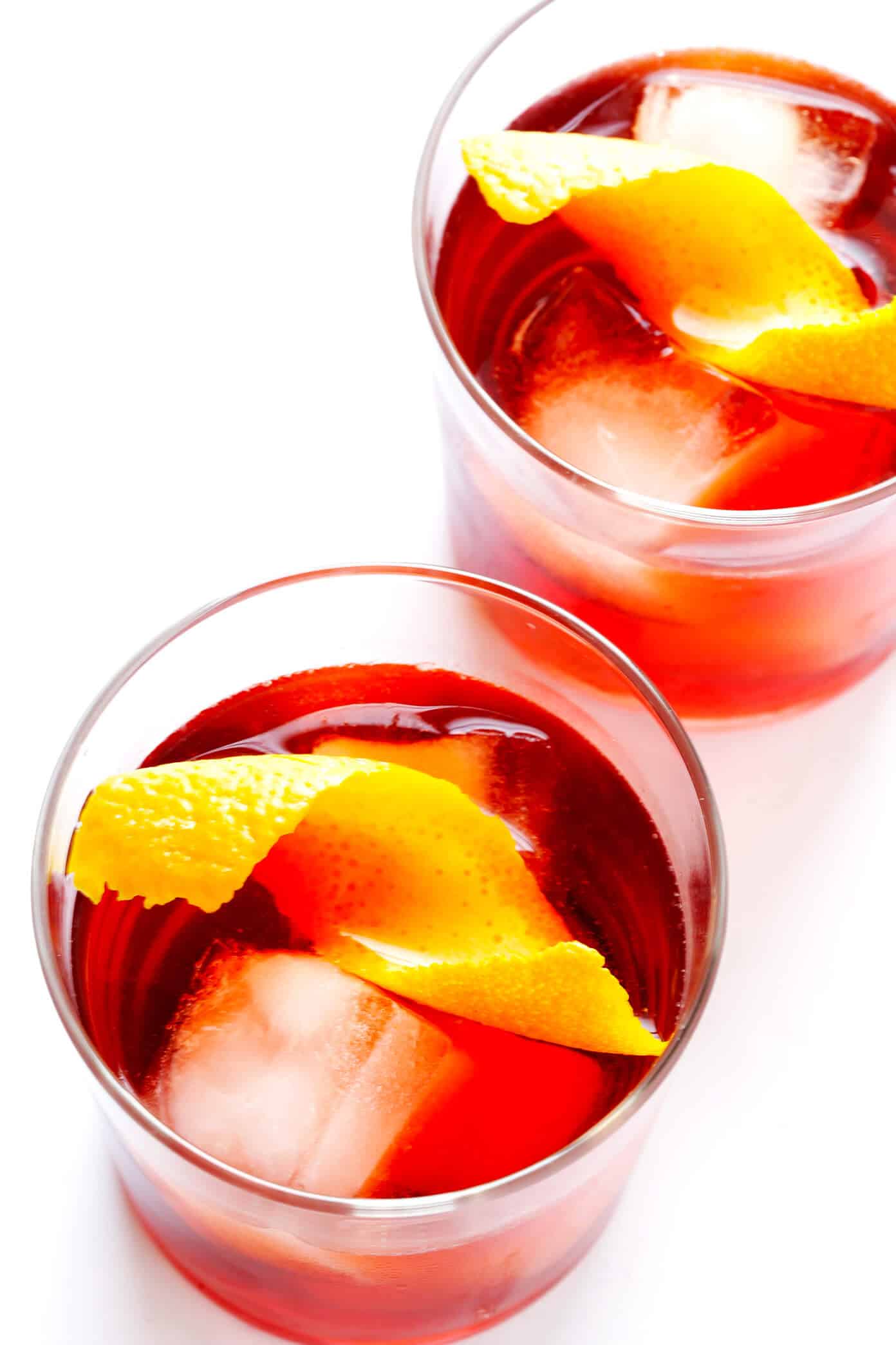 This classic negroni cocktail recipe is easy to make with three simple ingredients -- Campari, gin and sweet vermouth. It's the perfect cocktail for summer, Valentine's, 4th of July, or Christmas, and it's refreshingly not too sweet. | Gimme Some Oven #negroni #cocktail #gin #campari #vermouth #summer Classic Negroni Cocktail Recipe