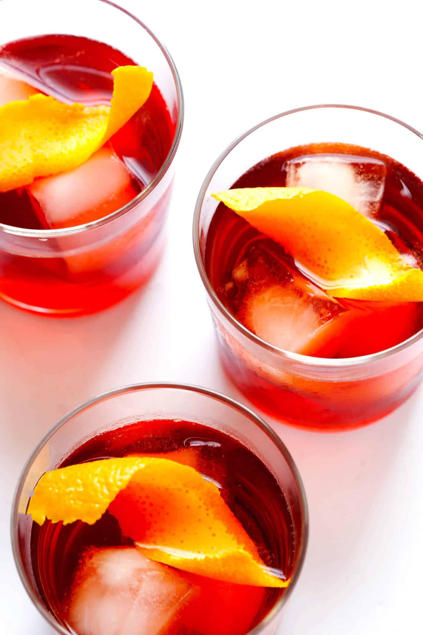 This classic negroni cocktail recipe is easy to make with three simple ingredients -- Campari, gin and sweet vermouth. It's the perfect cocktail for summer, Valentine's, 4th of July, or Christmas, and it's refreshingly not too sweet. | Gimme Some Oven #negroni #cocktail #gin #campari #vermouth #summer The Best Negroni Recipe