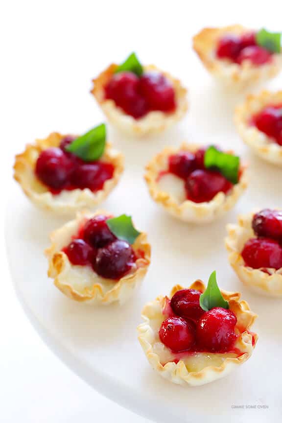 Super-Easy Cranberry Baked Brie Bites Recipe -- the perfect appetizer for holiday parties or anytime you're craving savory and sweet! | gimmesomeoven.com