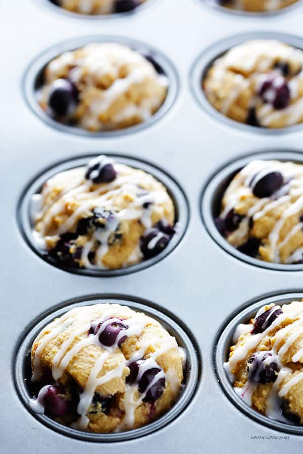 Healthier Blueberry Muffins -- made with white whole wheat flour, naturally sweetened, and SO fluffy and buttery and delicious! | gimmesomeoven.com