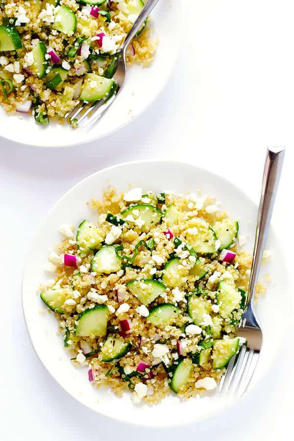 Love this Cucumber Quinoa Salad! It's super easy to make ahead of time, it's naturally gluten-free, and it's made with lots of fresh cucumber, feta, basil, red onion, and a simple lemon Italian vinaigrette. Perfect as a side or main dish! | gimmesomeoven.com