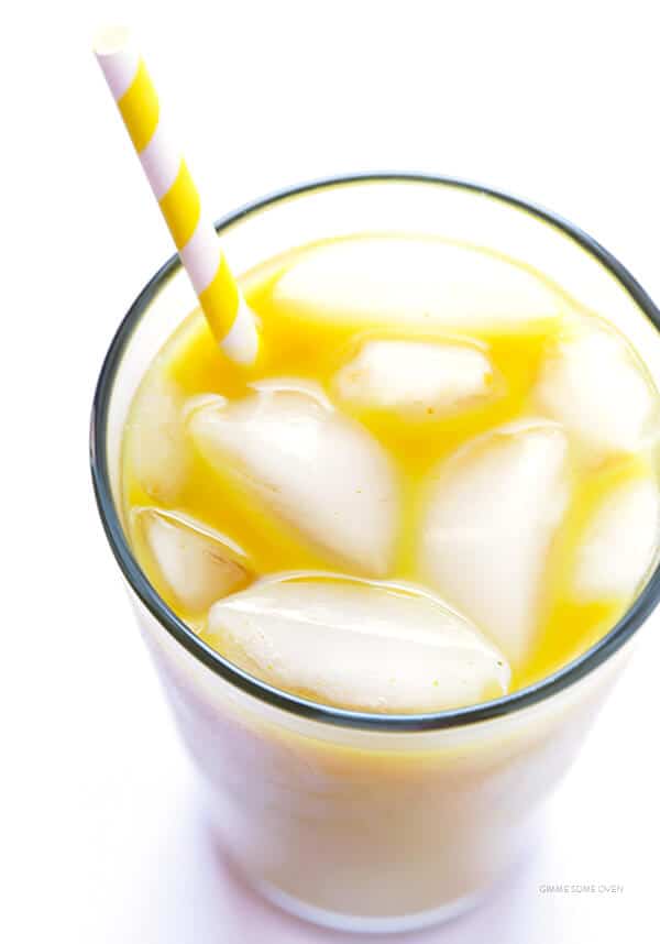 Learn how to make homemade hot or iced golden milk (turmeric milk) with this simple recipe. It tastes kind of like a chai, and it's quick and easy to make. | gimmesomeoven.com