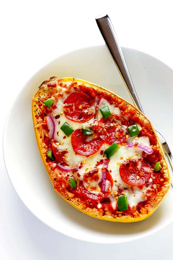 These Pizza Spaghetti Squash Boats are easy to make, fun to customize with your favorite pizza toppings, and absolutely delicious! | gimmesomeoven.com (Gluten-free)