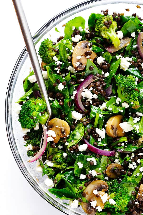 This Zesty Lentil Spinach Salad recipe is ready to go in about 30 minutes, made with hearty lentils, sauteed veggies, lots of fresh spinach, and a tangy lemon dressing. It's SO delicious, and also makes great leftovers! | gimmesomeoven.com (Vegetarian / Gluten-Free)