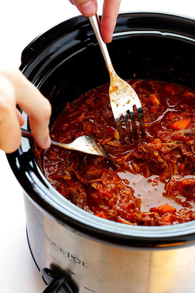 This Slow Cooker Beef Ragu is quick and easy to prep, and slow-simmered in the most AMAZING tomato sauce. Serve it over pasta, polenta, or whatever sounds good. | gimmesomeoven.com