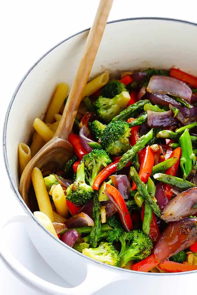 This Balsamic Veggie Pasta recipe is quick and easy to make, loaded with fresh veggies, and tossed with a delicious balsamic vinaigrette and Parmesan. So tasty!! | gimmesomeoven.com