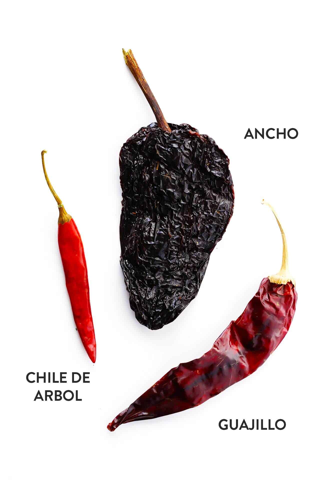 This traditional Mexican pozole recipe is made with tender pork and hominy and simmered in the most delicious chile broth, then piled high with your favorite fresh toppings. Crock-Pot and Instant Pot options for this soup are included too! | gimmesomeoven.com Chiles to make pozole - ancho, guajillo and chile de arbol