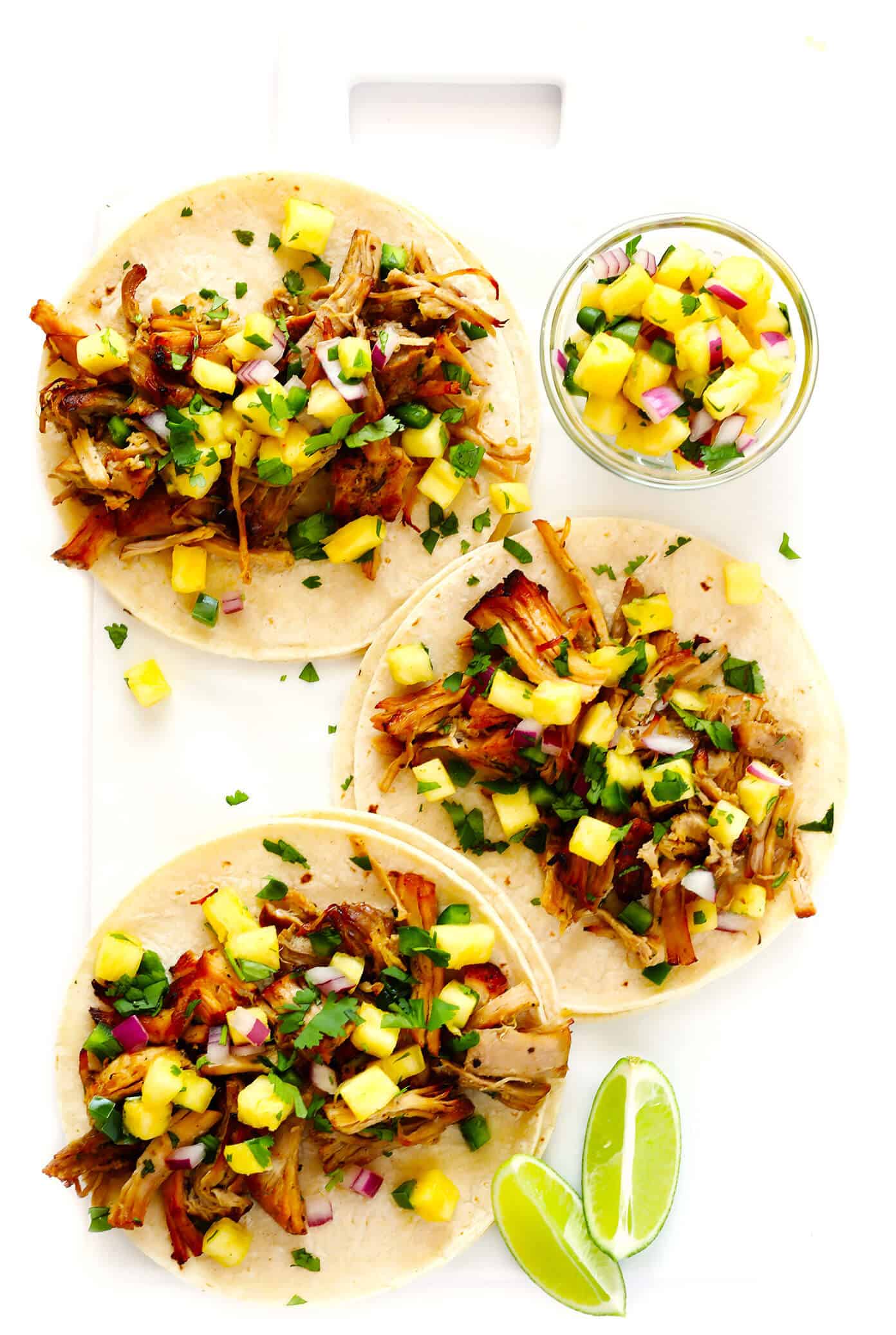 This Instant Pot Carnitas recipe is extra quick and easy to make in the pressure cooker. It's also simmered with a garlic citrus mojo sauce for extra flavor, then broiled briefly in the oven to make the pork extra crispy. Perfect for tacos, burritos, quesadillas, salads and more! | gimmesomeoven.com #carnitas #tacos #mexican #pork #dinner #instantpot #pressurecooker #mealprep Pork Carnitas Tacos
