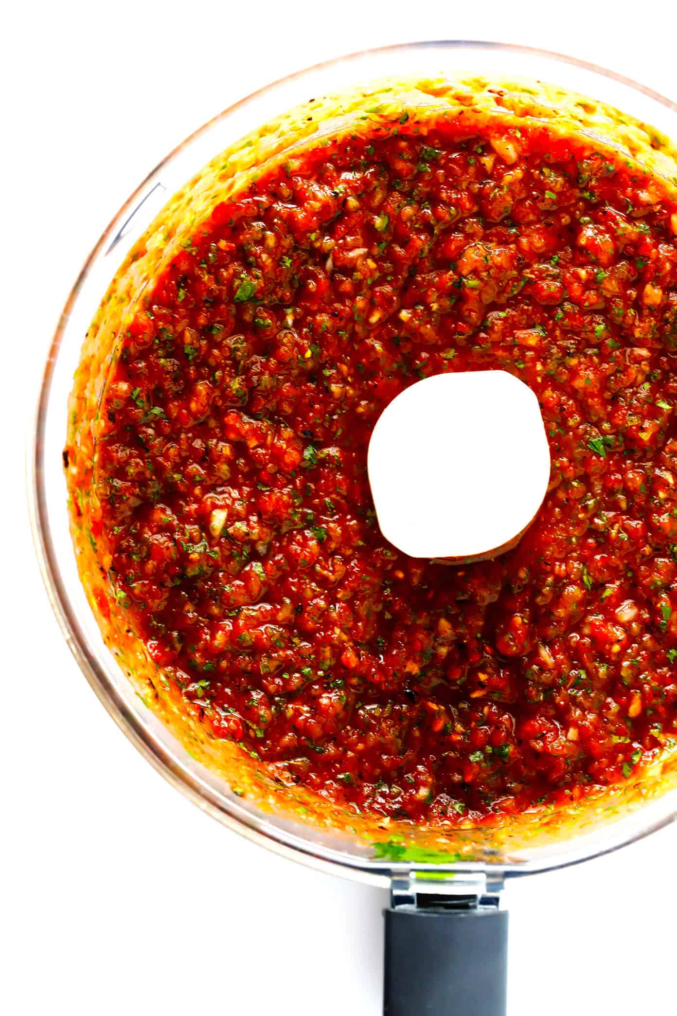 My all-time favorite homemade salsa recipe!! It's quick and easy to make in a food processor or blender, it's easy to make spicy or mild, and it is SO flavorful and delicious! | Gimme Some Oven #mexican #salsa #appetizer #dip #easyrecipes Blended homemade salsa
