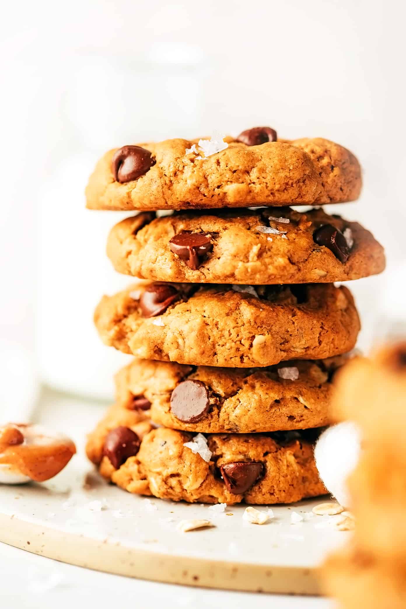 This healthy peanut butter cookies recipe is incredibly delicious and easy to make by hand in less than 30 minutes with just 7 ingredients. Feel free to add in some chocolate chips or nuts too! | gimmesomeoven.com (gluten-free) Healthy Peanut Butter Chocolate Chip Cookies in Stack