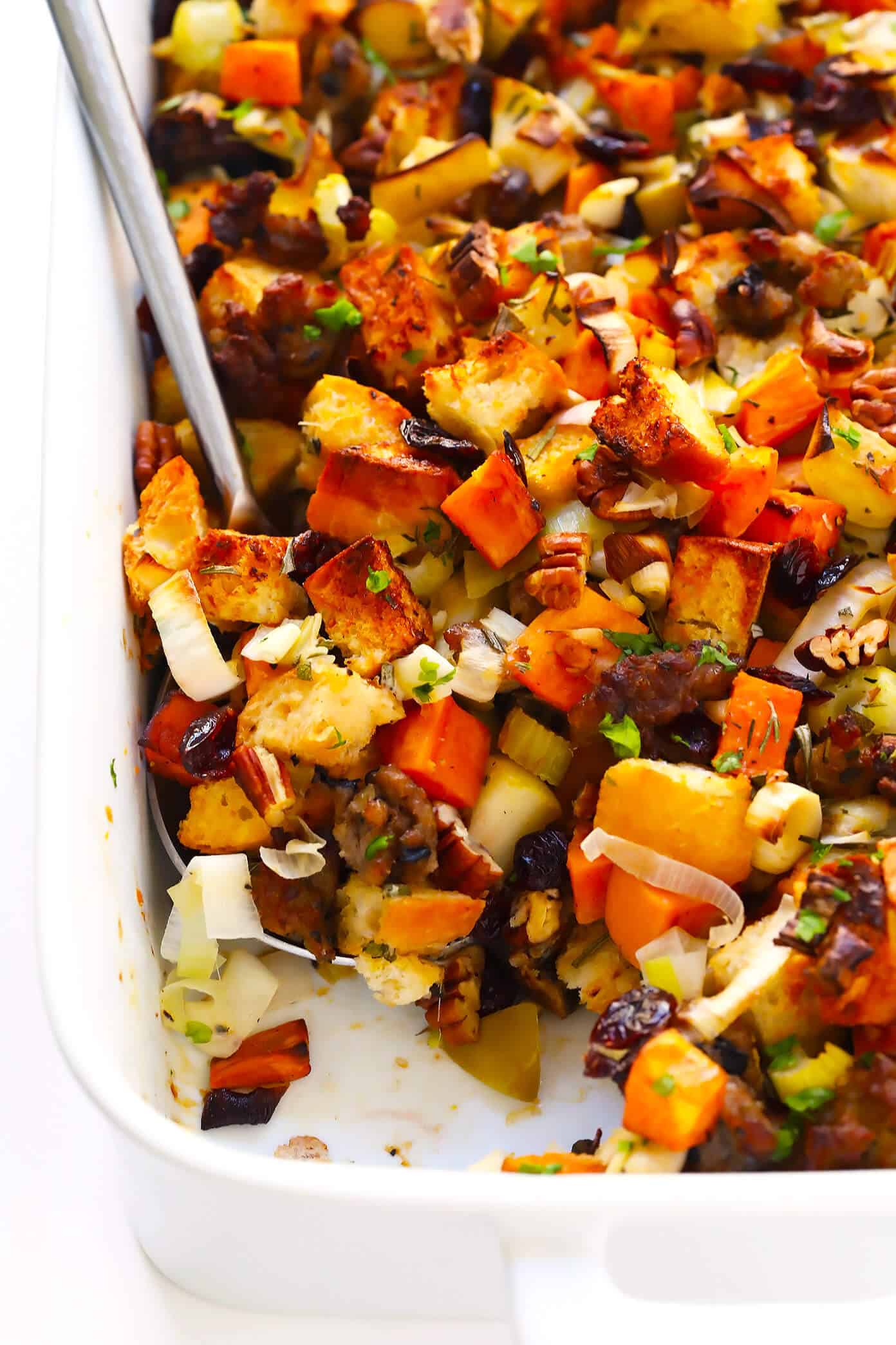 This Sausage and Sweet Potato Thanksgiving Stuffing recipe is a total winner! It's the perfect balance of sweet and savory, and always a crowd fave. | Gimme Some Oven #thanksgiving #stuffing #recipe #sausage #holiday Sausage and Sweet Potato Thanksgiving Stuffing Recipe