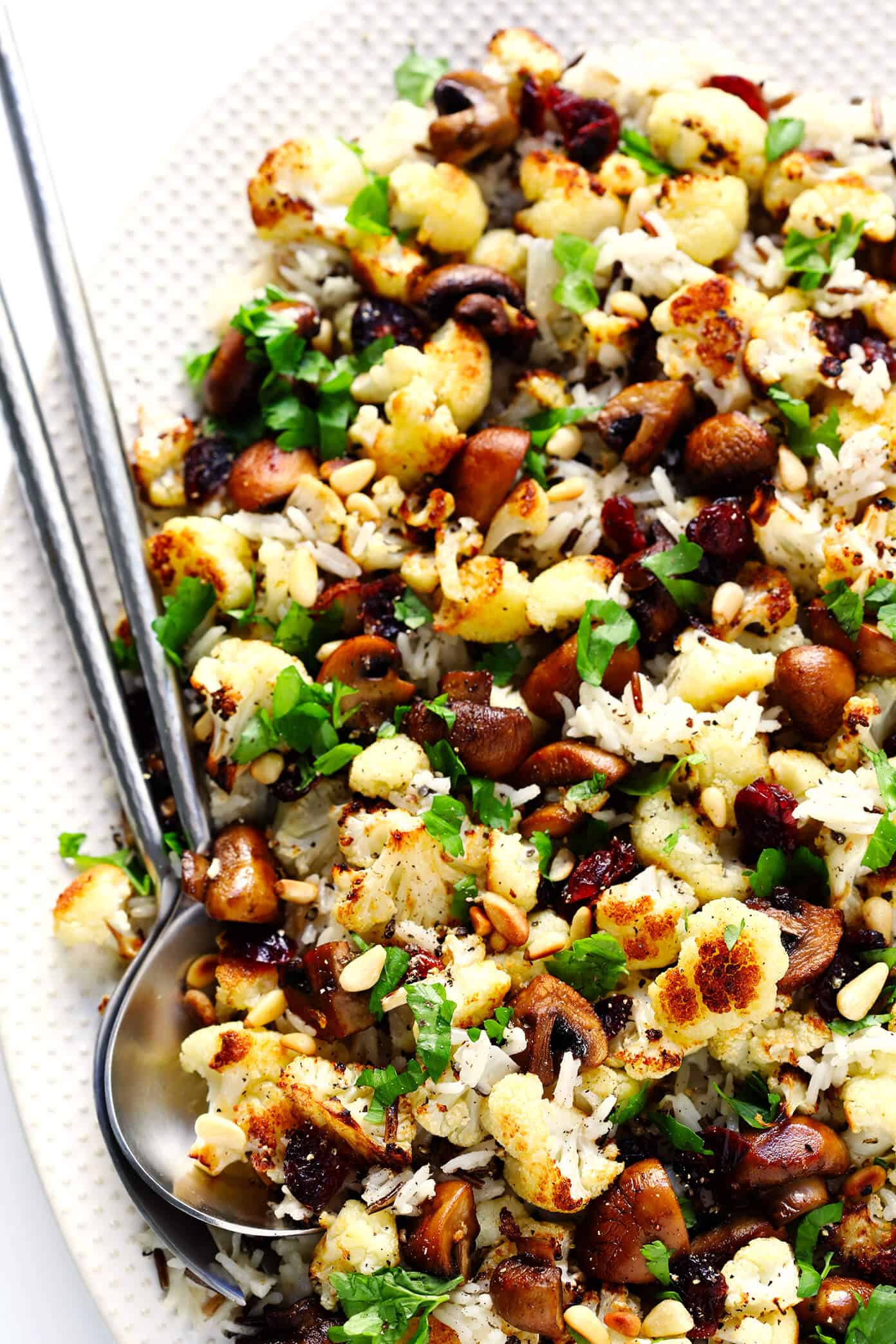 Love this Roasted Cauliflower, Mushroom and Wild Rice Stuffing Recipe! It's quick and easy to make, naturally #glutenfree and #vegan, and absolutely delicious. Perfect for Thanksgiving or any day of the year! | Gimme Some Oven #thanksgiving #stuffing #glutenfree #vegan #vegetarian #holiday Roasted Cauliflower, Mushroom and Wild Rice Stuffing Recipe