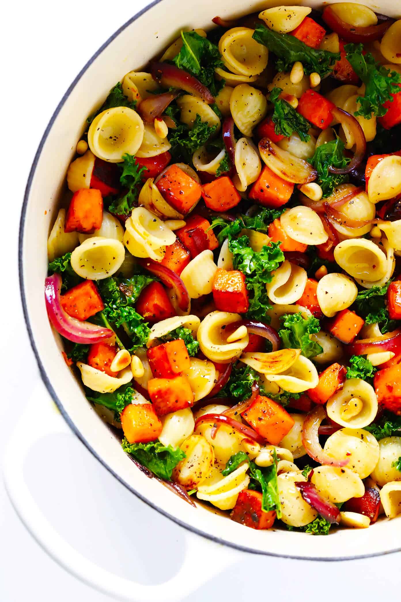 LOVE this Pasta with Caramelized Sweet Potatoes and Kale! It's tossed with a delicious balsamic and garlic sauce, it's naturally vegetarian, and makes a delicious fall or winter dinner recipe. | Gimme Some Oven #pasta #vegetarian #vegetables #kale #dinner #recipe Vegetarian Pasta with Caramelized Sweet Potatoes, Kale and Parmesan | 20 Vegetarian Dinner Ideas