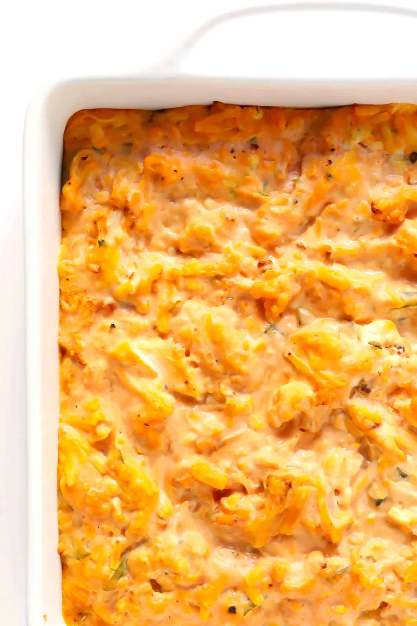 Love this vegetarian Buffalo Cauliflower Dip! It's easy to make in the oven or slow cooker, it's full of big flavors, and it's the perfect appetizer for game day! | Gimme Some Oven #buffalocauliflower #diprecipes #appetizer #vegetarianrecipes Baked Buffalo Cauliflower Dip