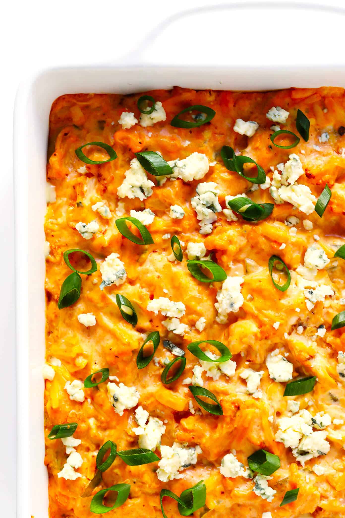 Love this vegetarian Buffalo Cauliflower Dip! It's easy to make in the oven or slow cooker, it's full of big flavors, and it's the perfect appetizer for game day! | Gimme Some Oven #buffalocauliflower #diprecipes #appetizer #vegetarianrecipes Buffalo Cauliflower Dip
